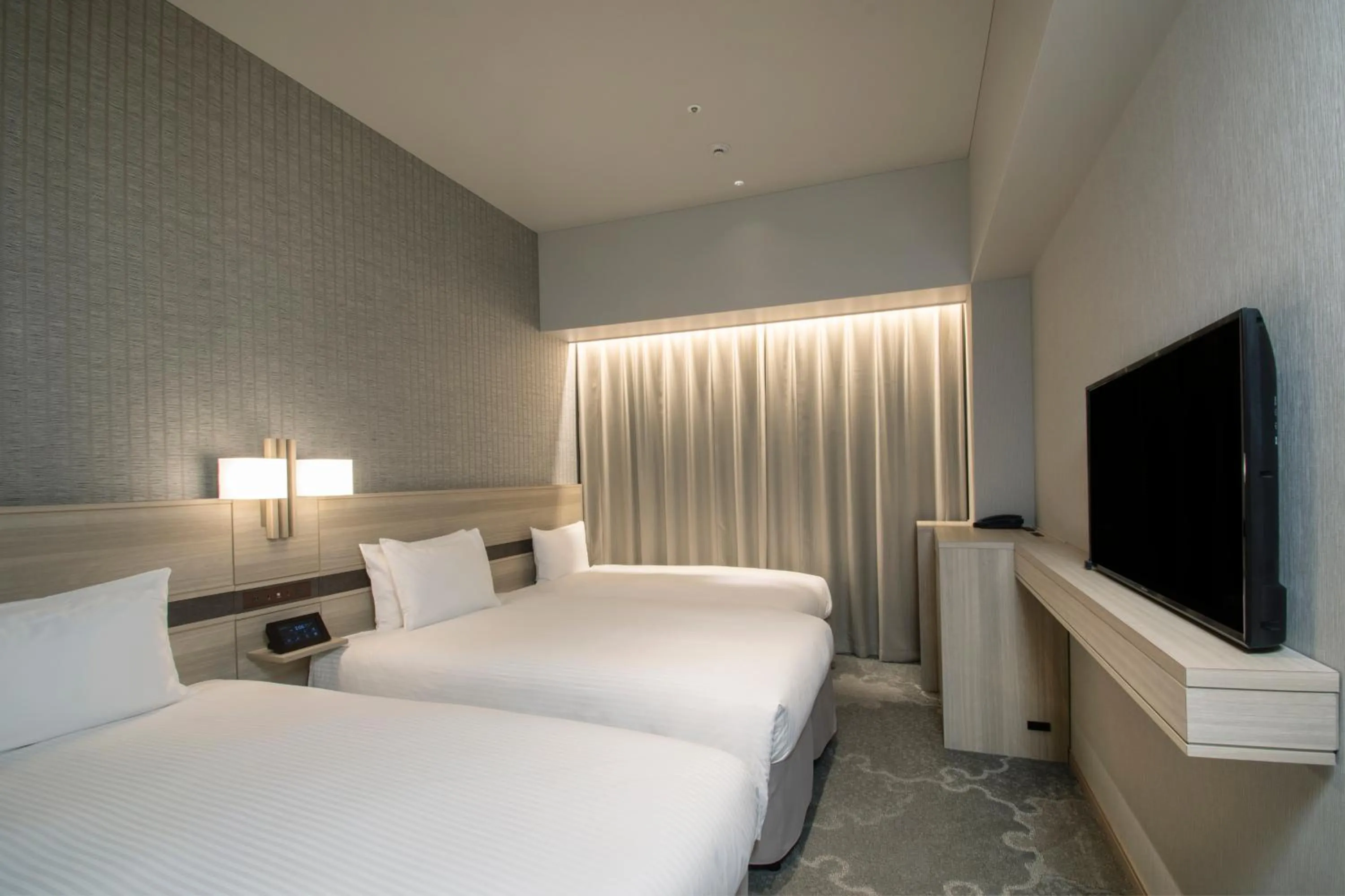 Bed in Hotel Keihan Tsukiji Ginza Grande