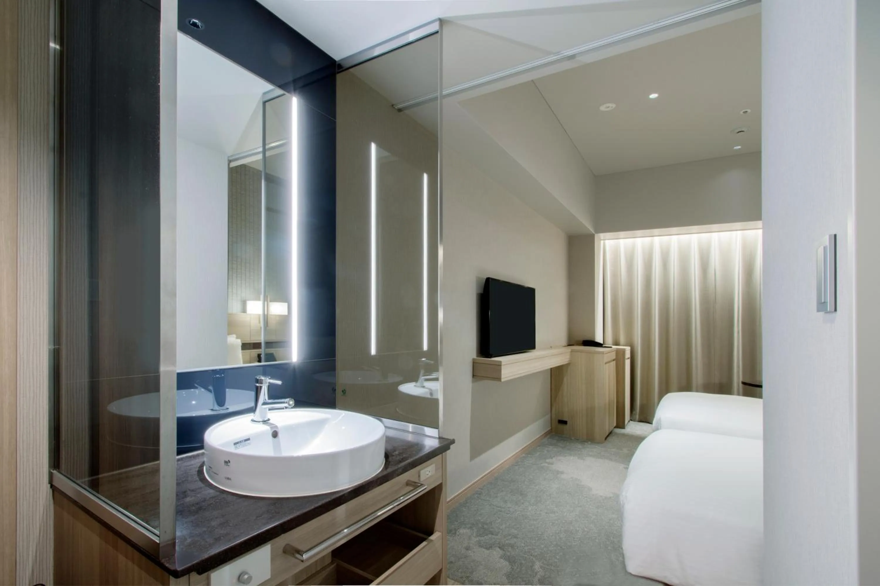 Bed in Hotel Keihan Tsukiji Ginza Grande