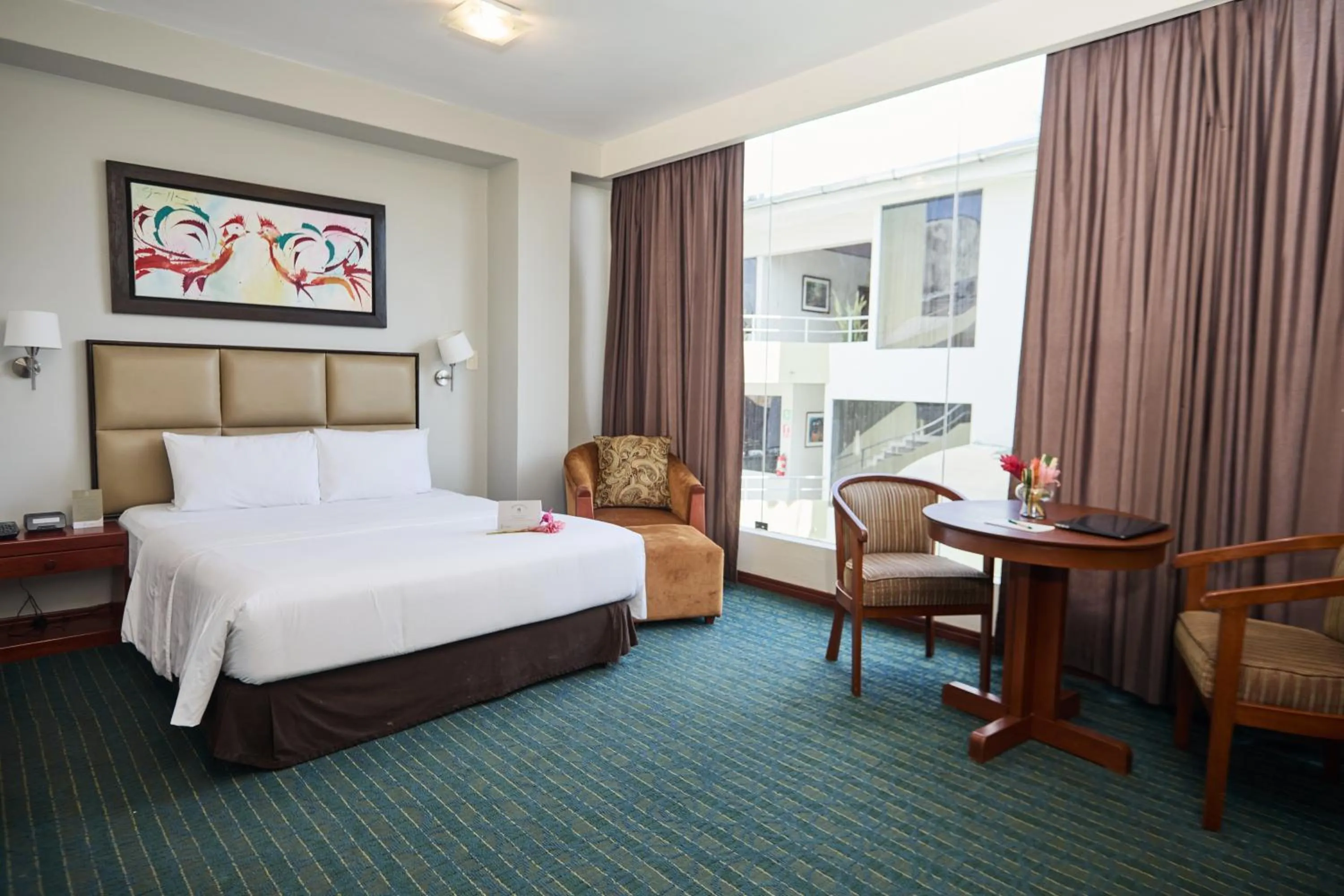 Bed in El Dorado Classic Hotel