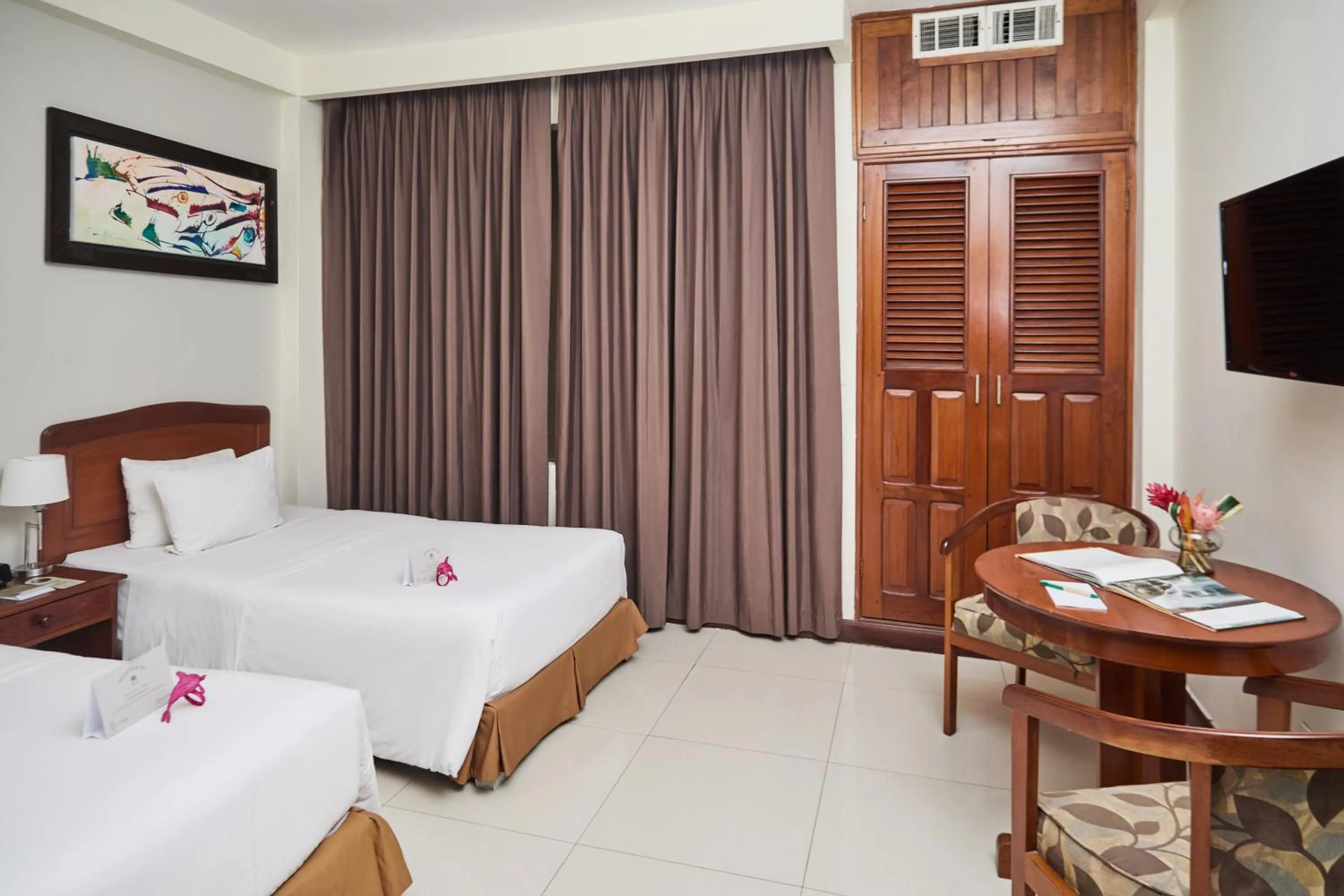 Bed in El Dorado Classic Hotel