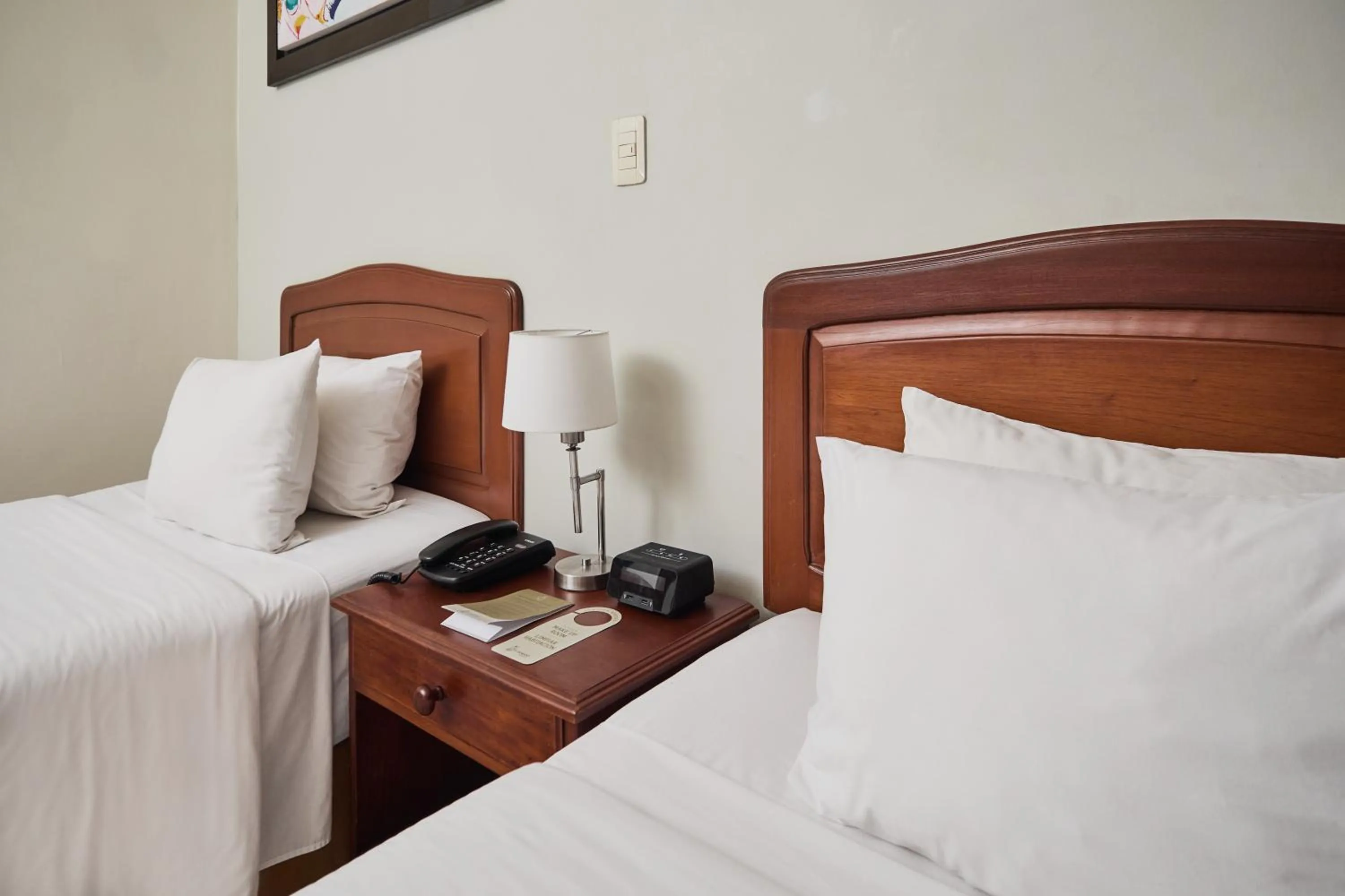 Bed in El Dorado Classic Hotel