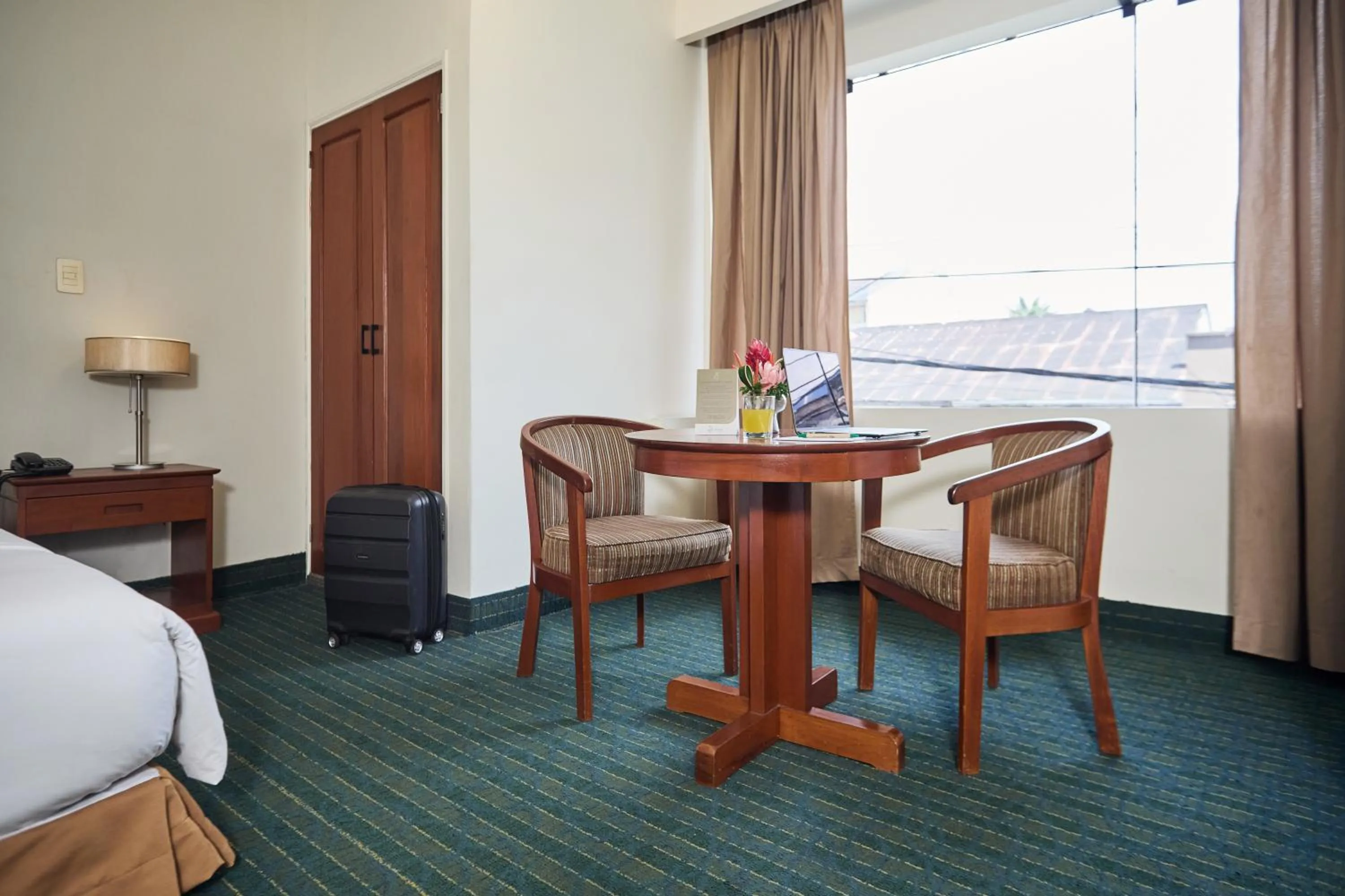 Bed in El Dorado Classic Hotel