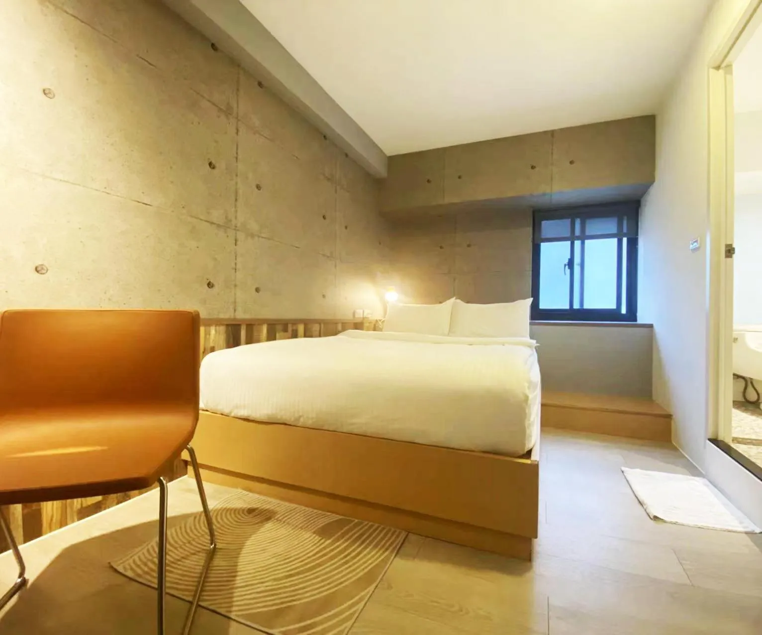 Bed in M Taipei Hotel