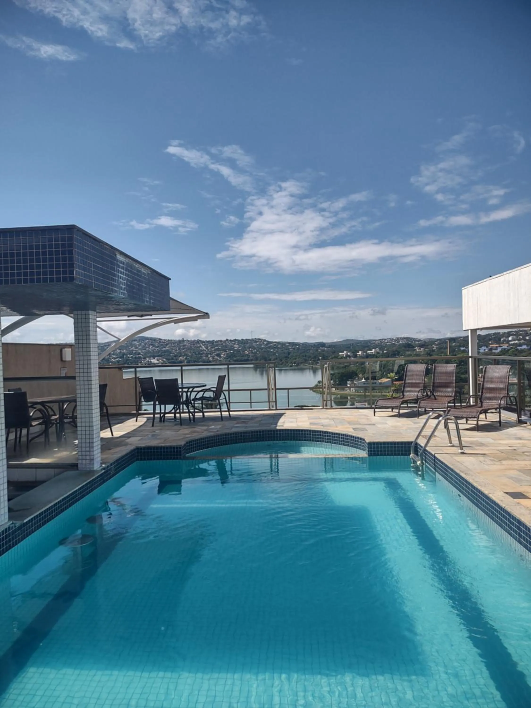 Pool view in Ramada Hotel & Suites Lagoa Santa By Wyndham