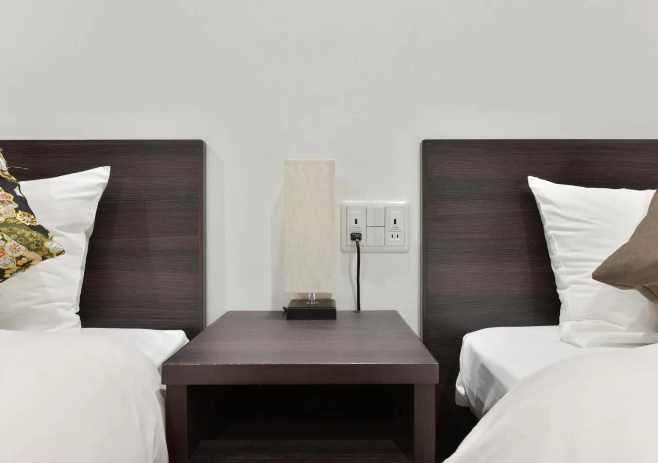 Bed in Villa Front Kyoto Seimei