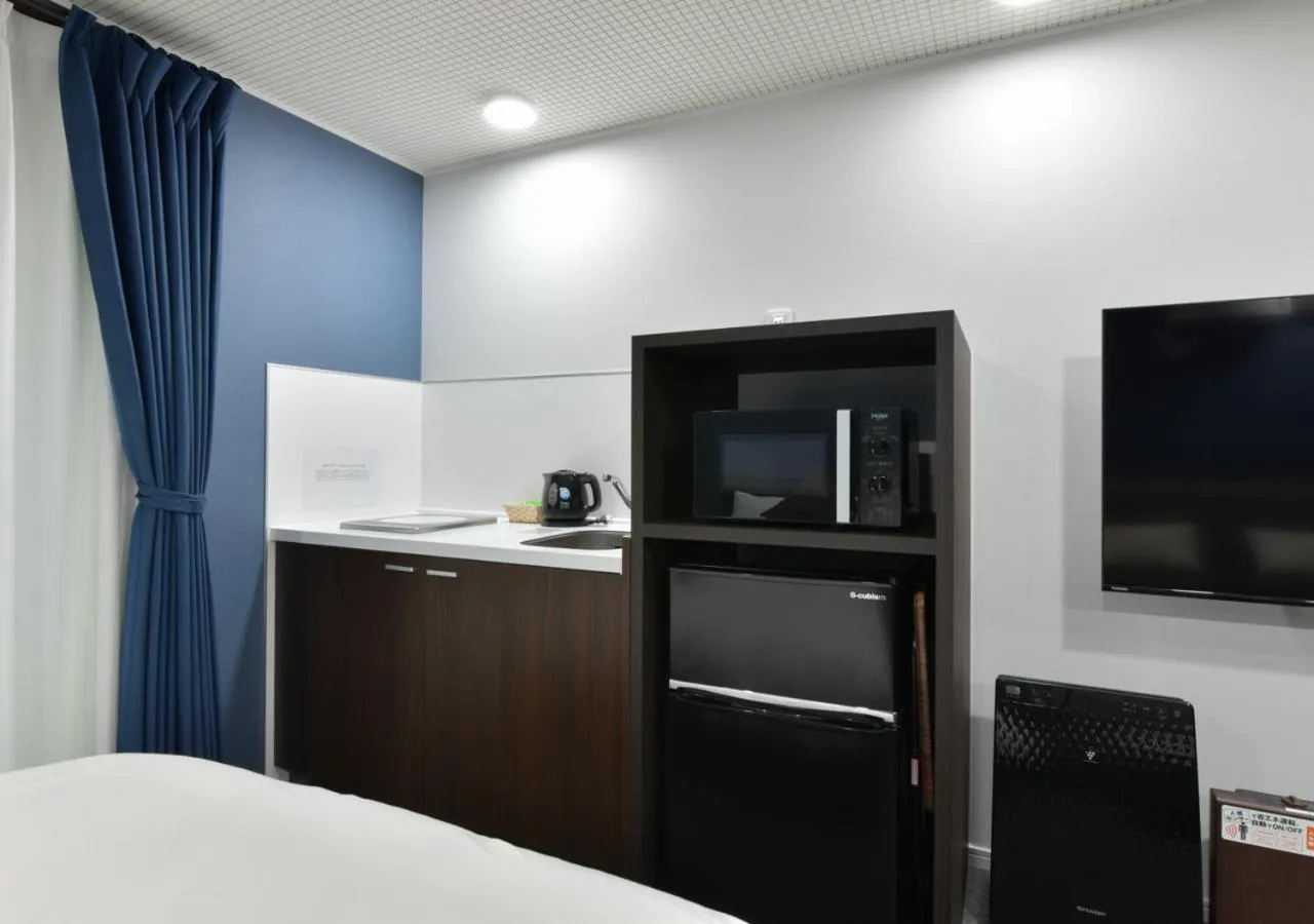 Kitchen or kitchenette, Bed in Villa Front Kyoto Seimei