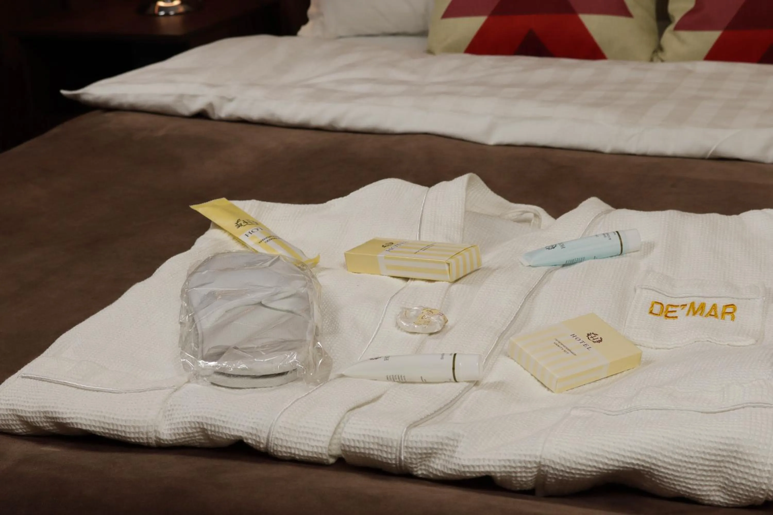 Bed in De'Mar Hotel