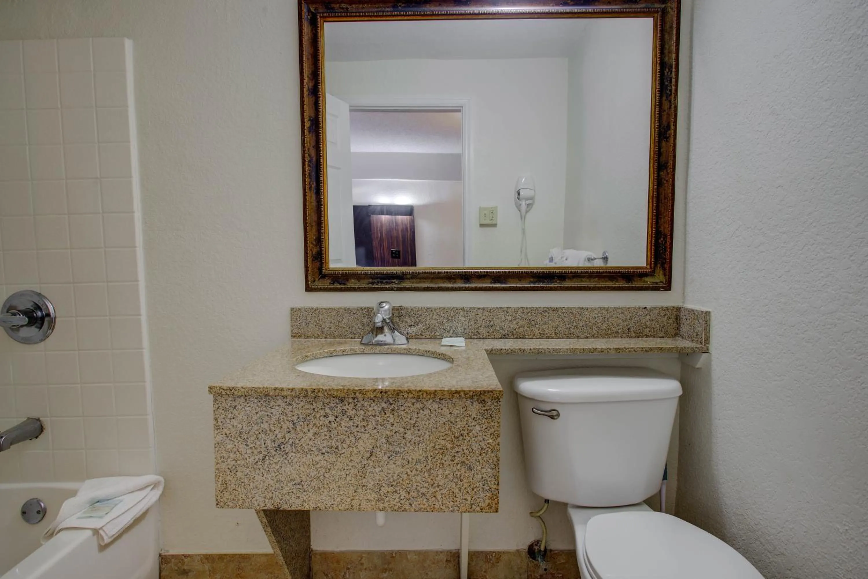 Toilet in La Bella Inn - POOL OPEN