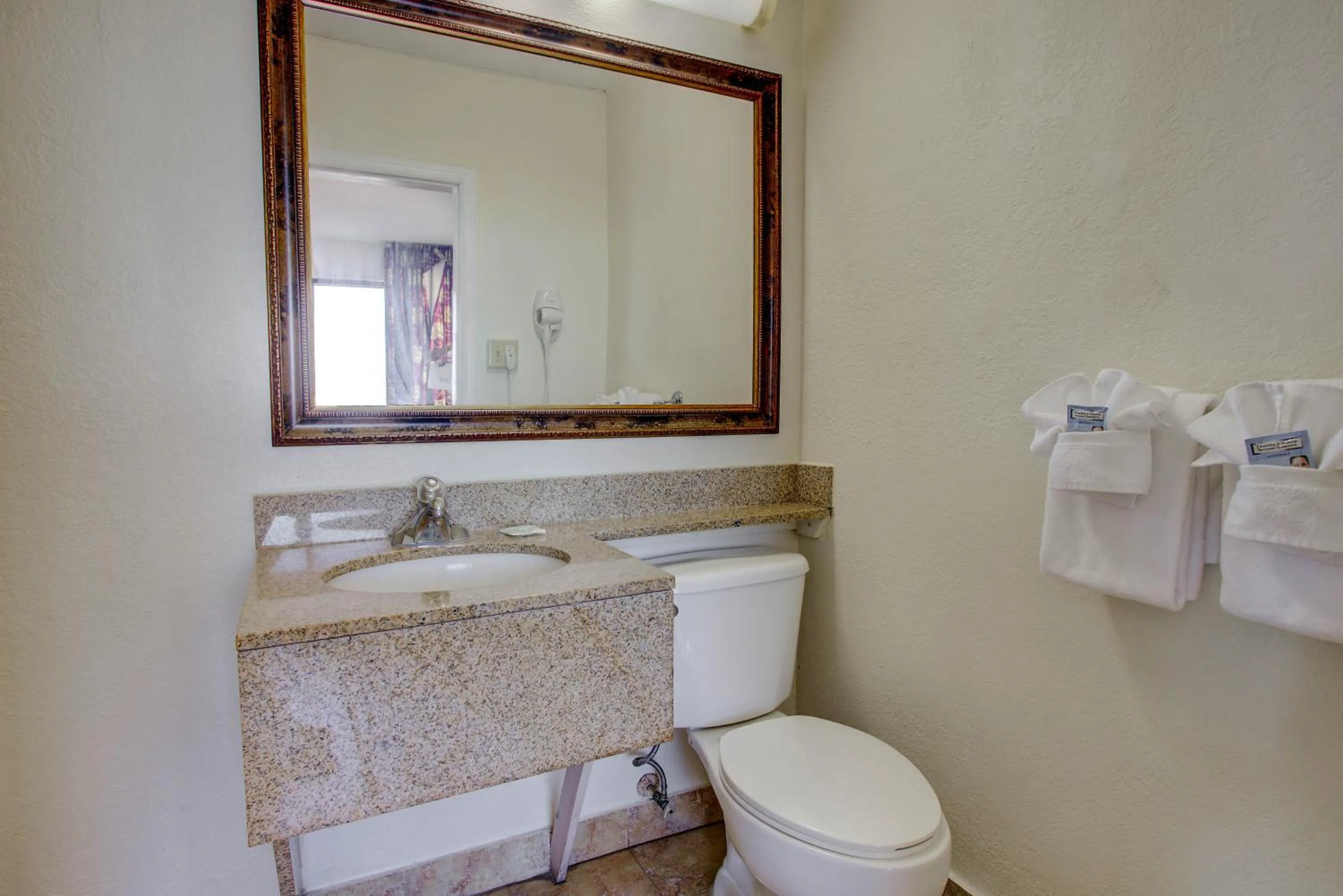 Toilet in La Bella Inn - POOL OPEN