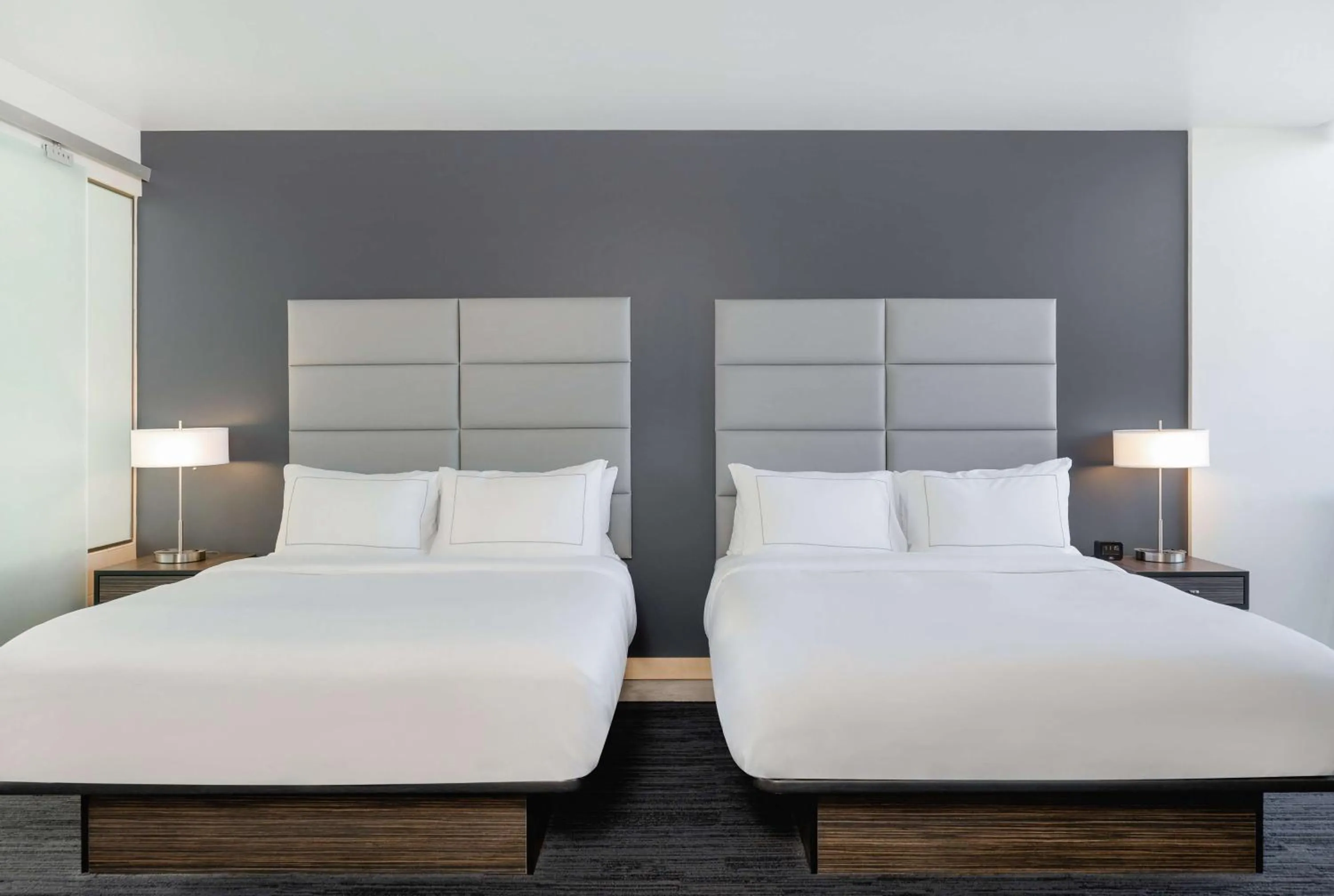 Queen Room with Two Queen Beds and Kitchenette in Hotelvetro Iowa City, Tapestry Collection By Hilton