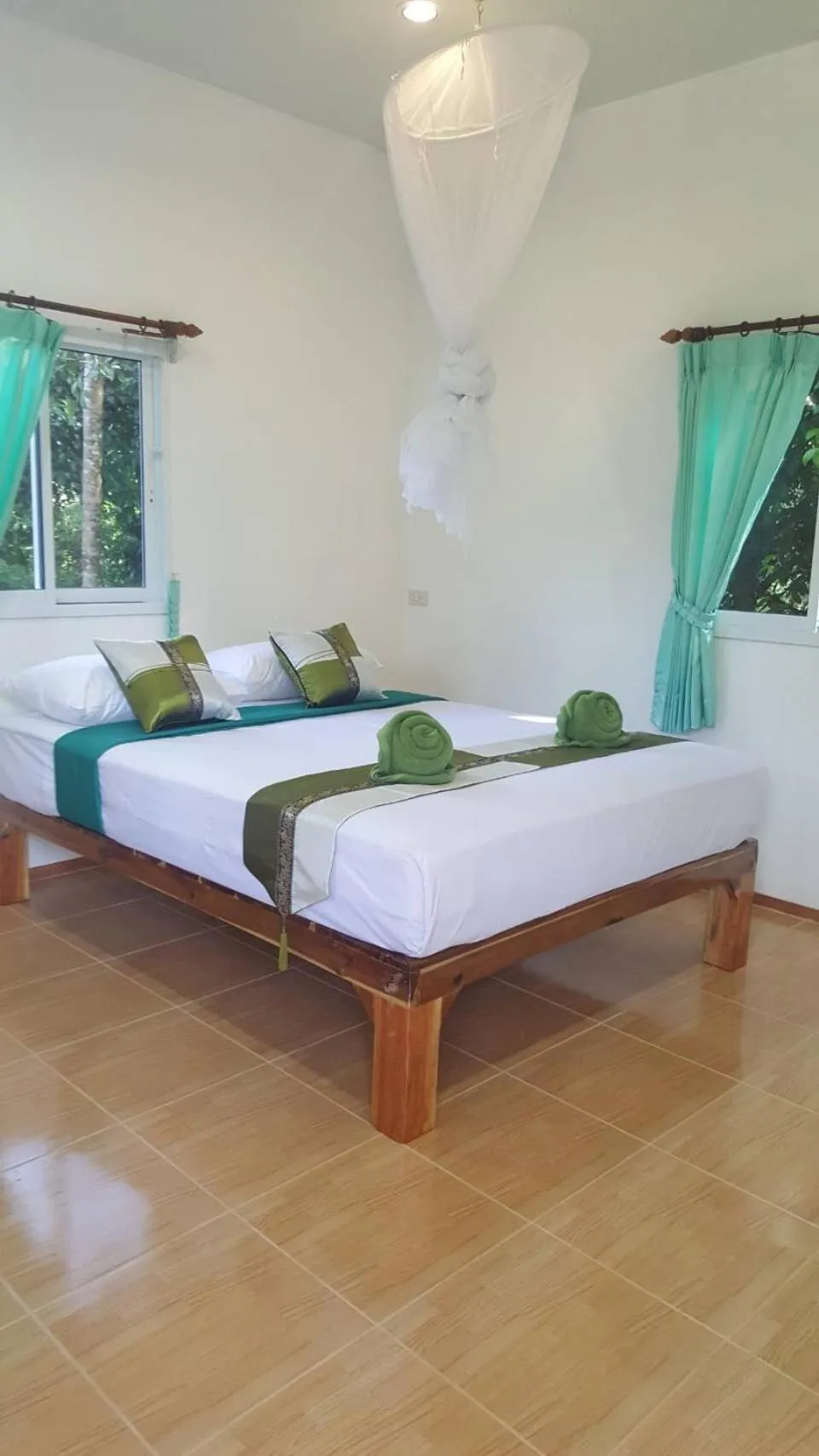 Photo of the whole room, Bed in Khaosok Bamboo Huts Resort