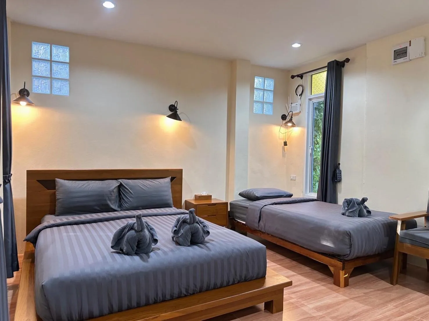 Photo of the whole room, Bed in Khaosok Bamboo Huts Resort