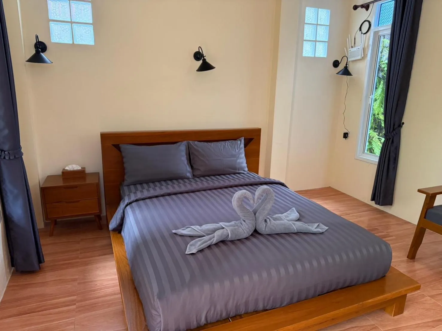 Bed in Khaosok Bamboo Huts Resort