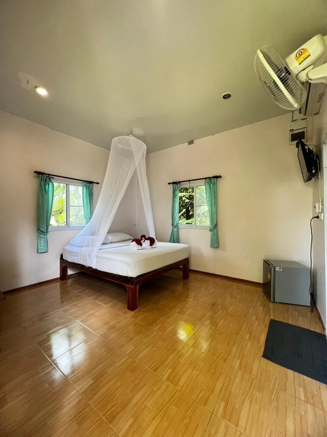 Bed in Khaosok Bamboo Huts Resort