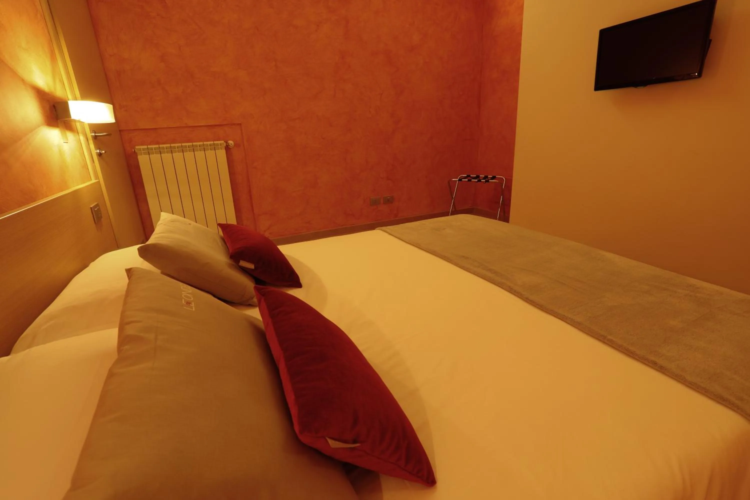 Bed in Le Onde Resort