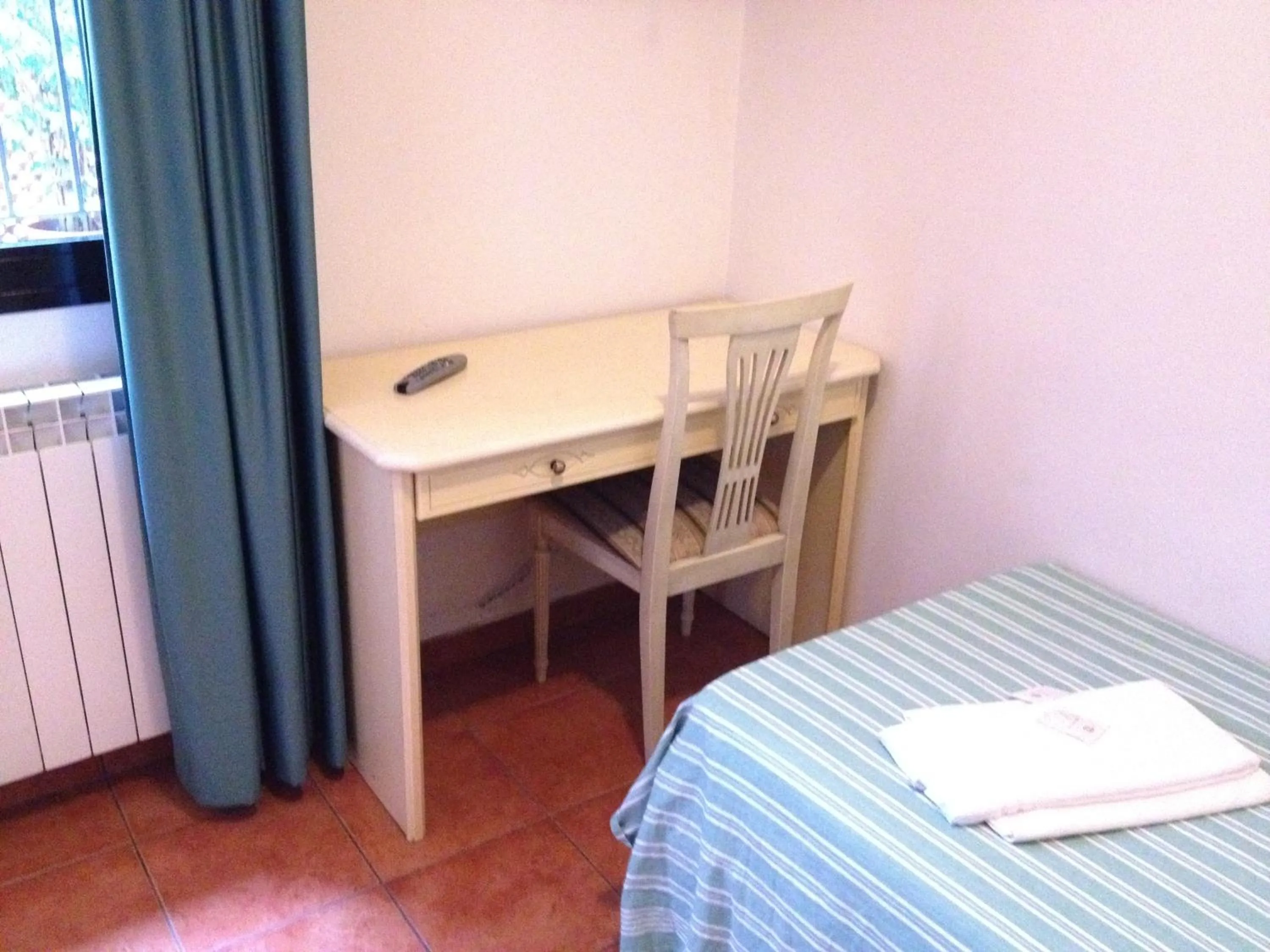 Decorative detail, Bed in Albergo Sonia