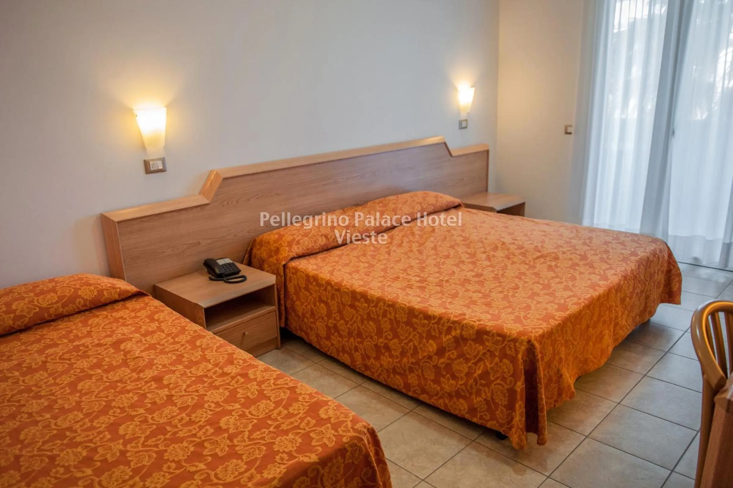 Bedroom in Pellegrino Palace Hotel