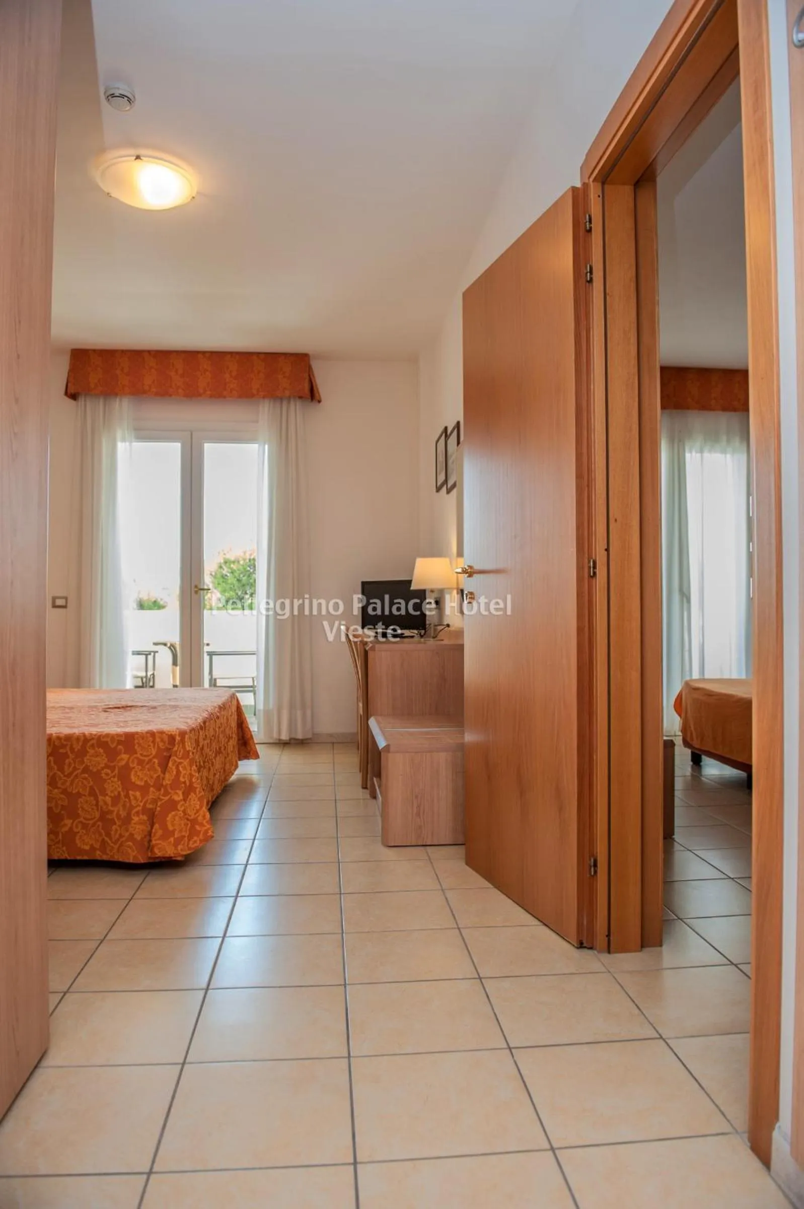 Bedroom in Pellegrino Palace Hotel