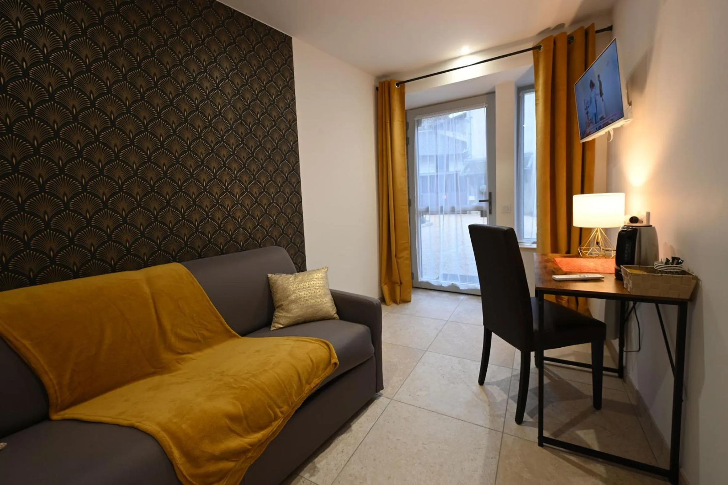 TV and multimedia in Hotel De La Croisée