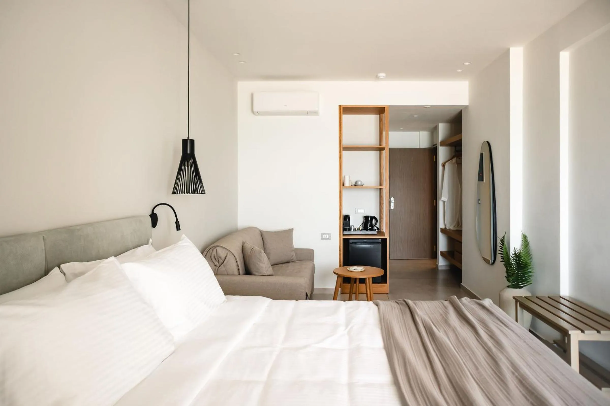 Bed in Batis Aero Beachfront Wellbeing Hotel