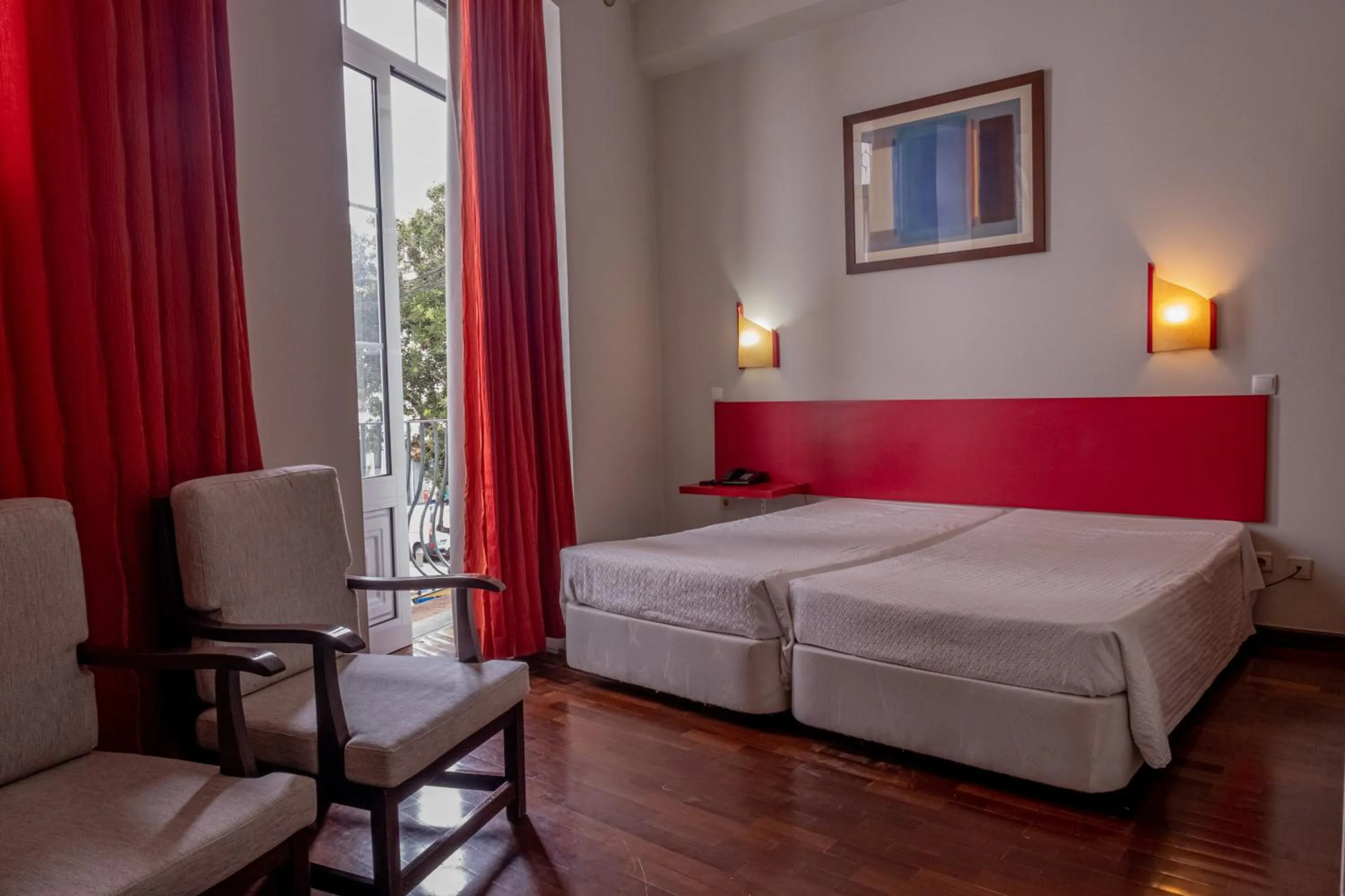 Seating area, Bed in Residencial Chafariz /Queimada