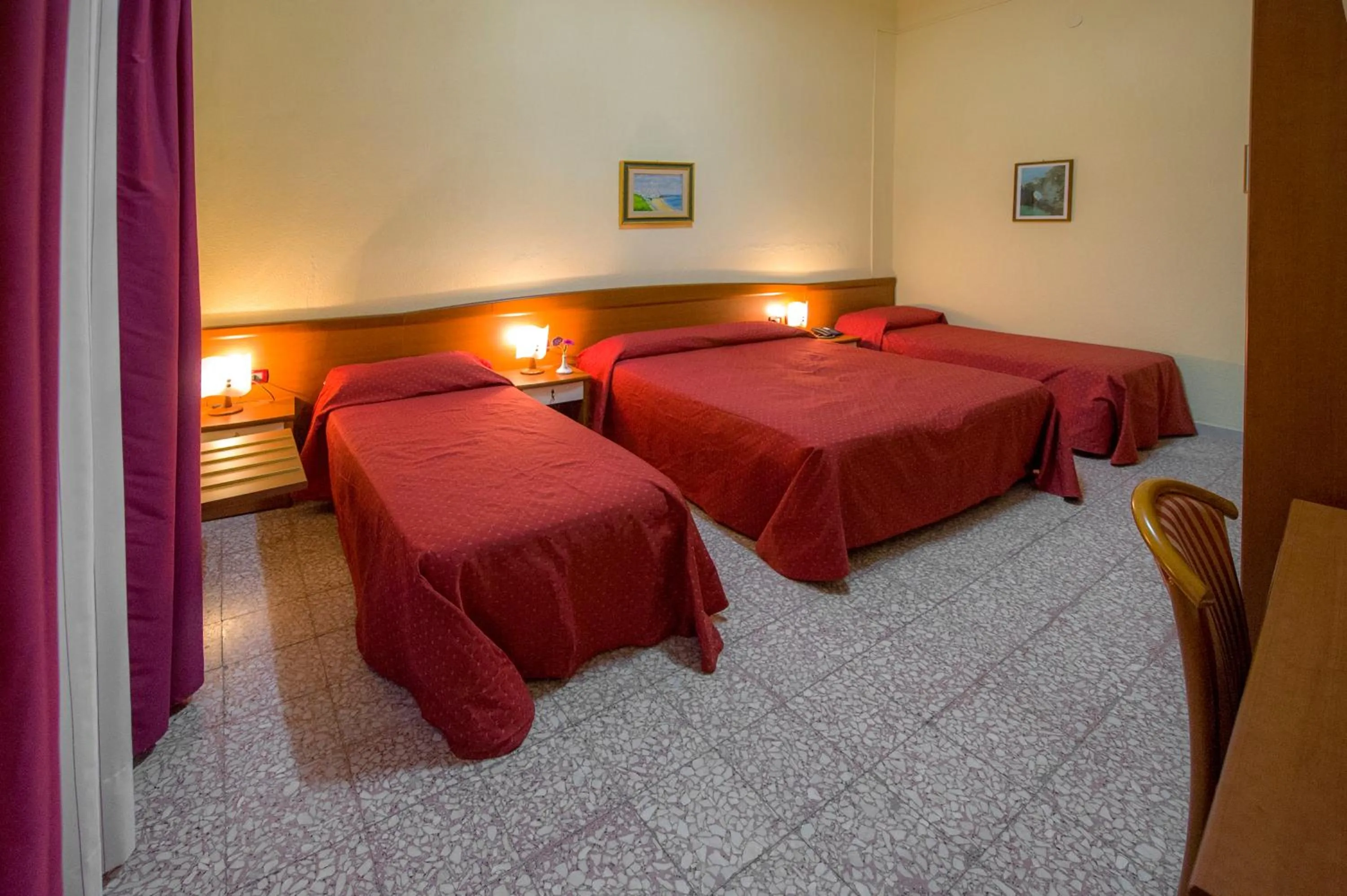 Bed in Hotel Miramare