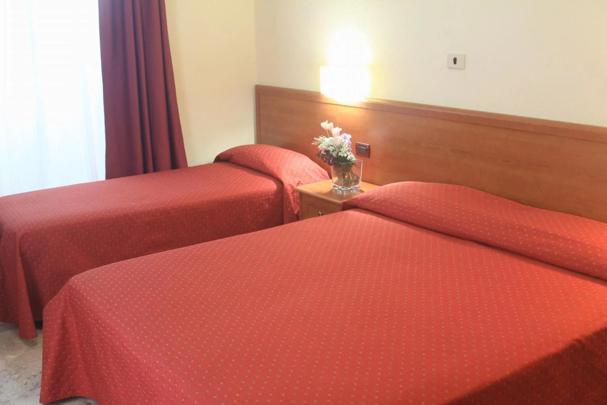 Bed in Hotel Miramare