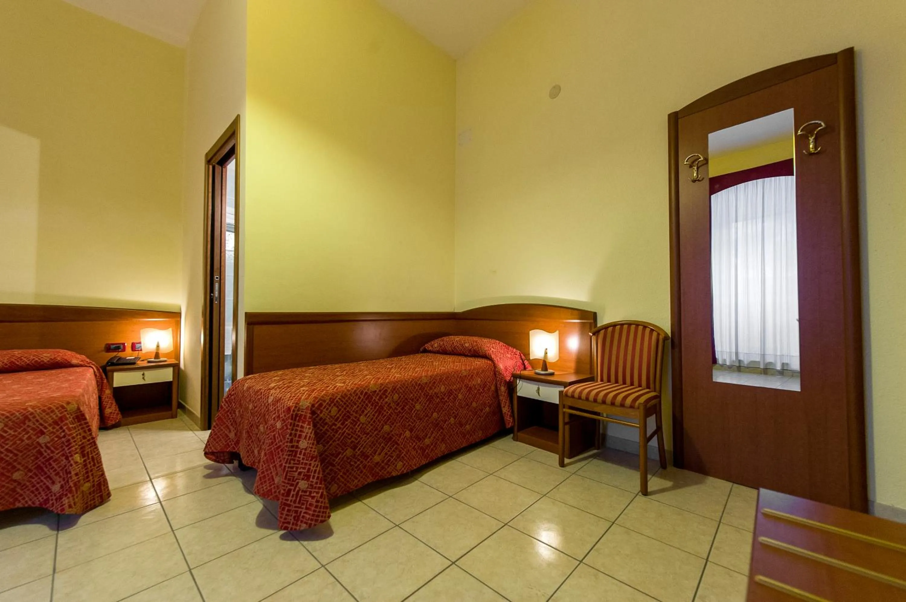 Bed in Hotel Miramare