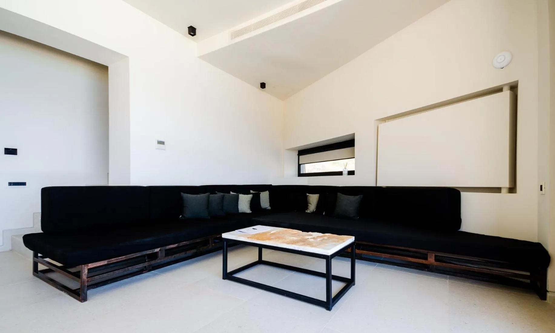 Seating area in Milos Cove