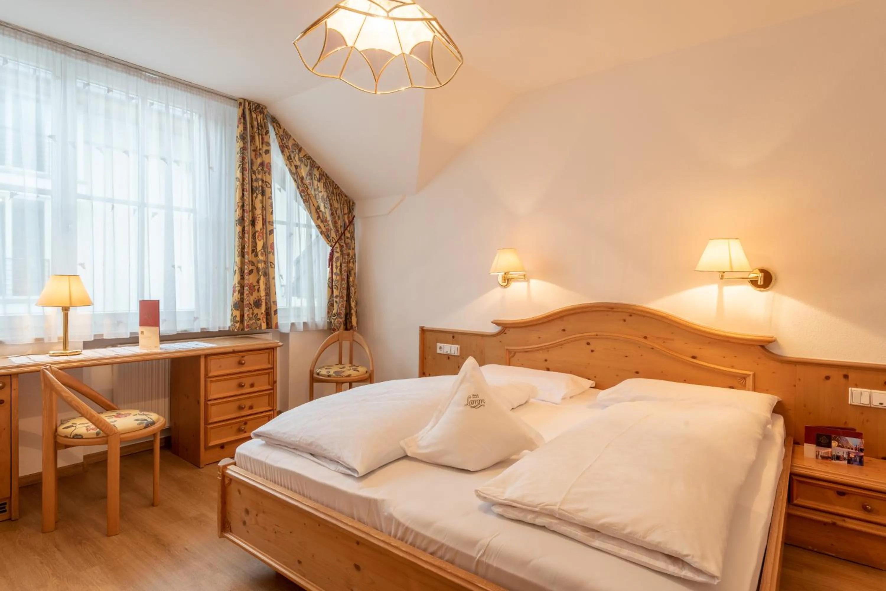 Bed in Posthotel Lamm