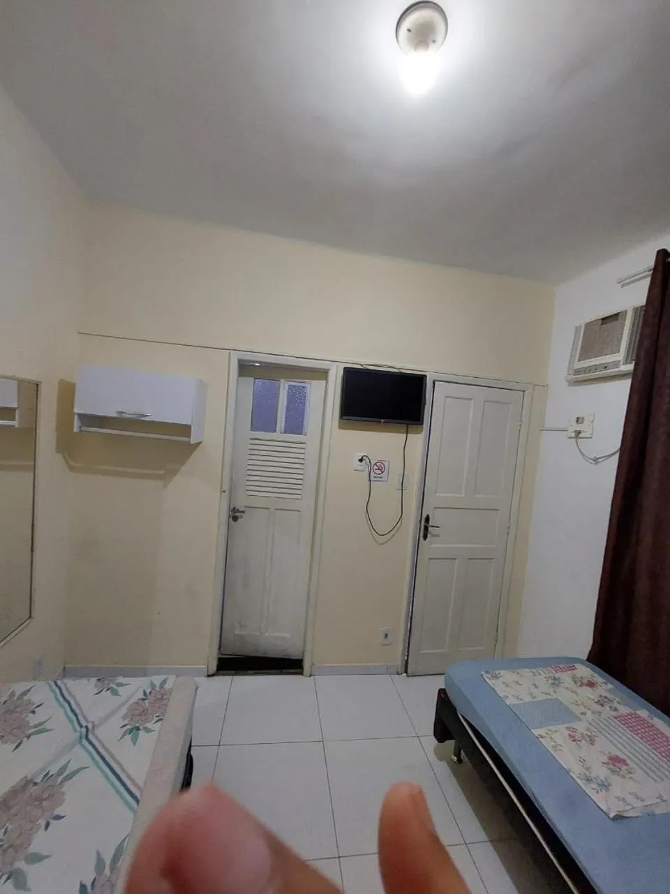 Bed in Pousada Cantinho da Família