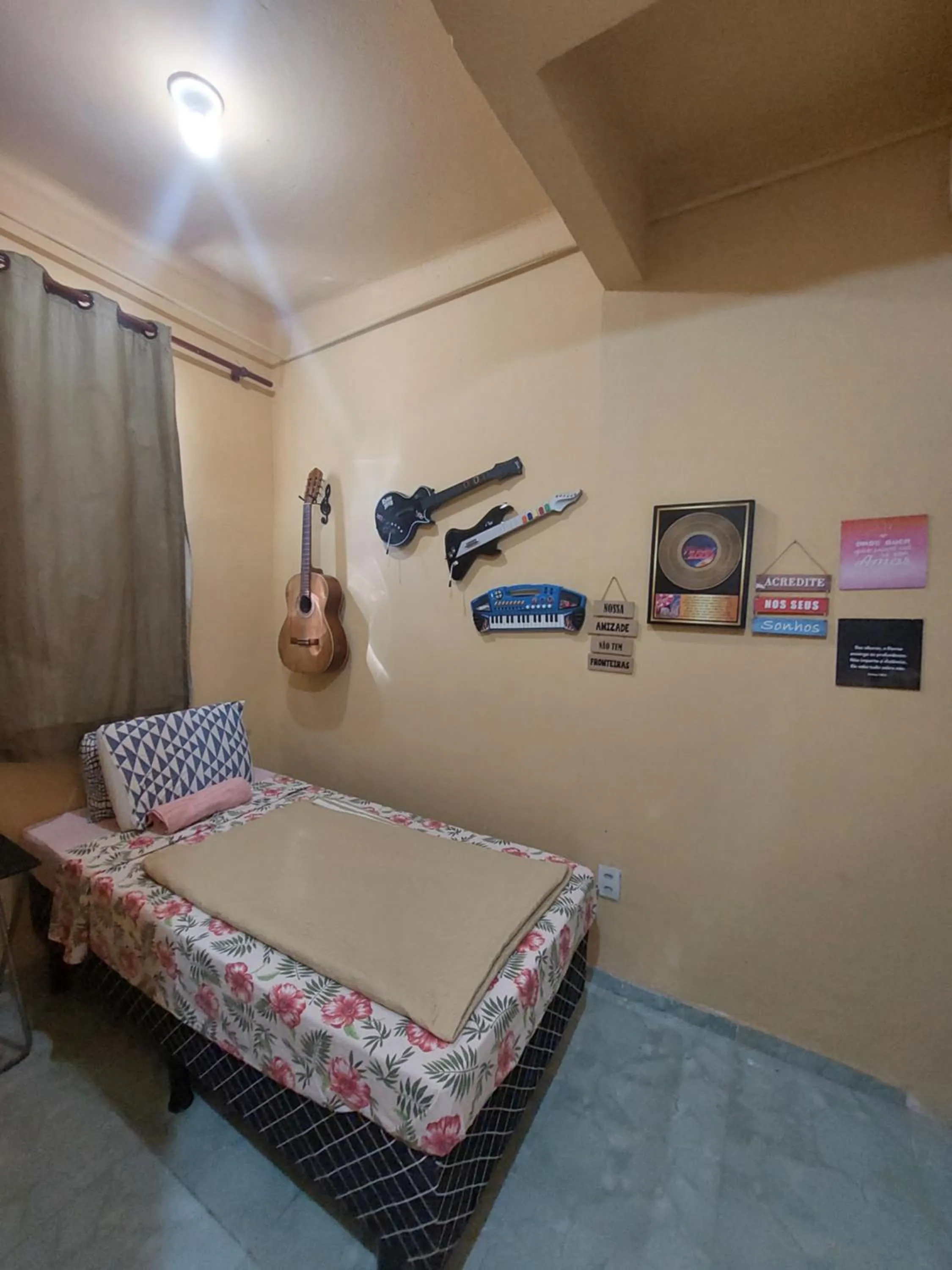 Bed in Pousada Cantinho da Família