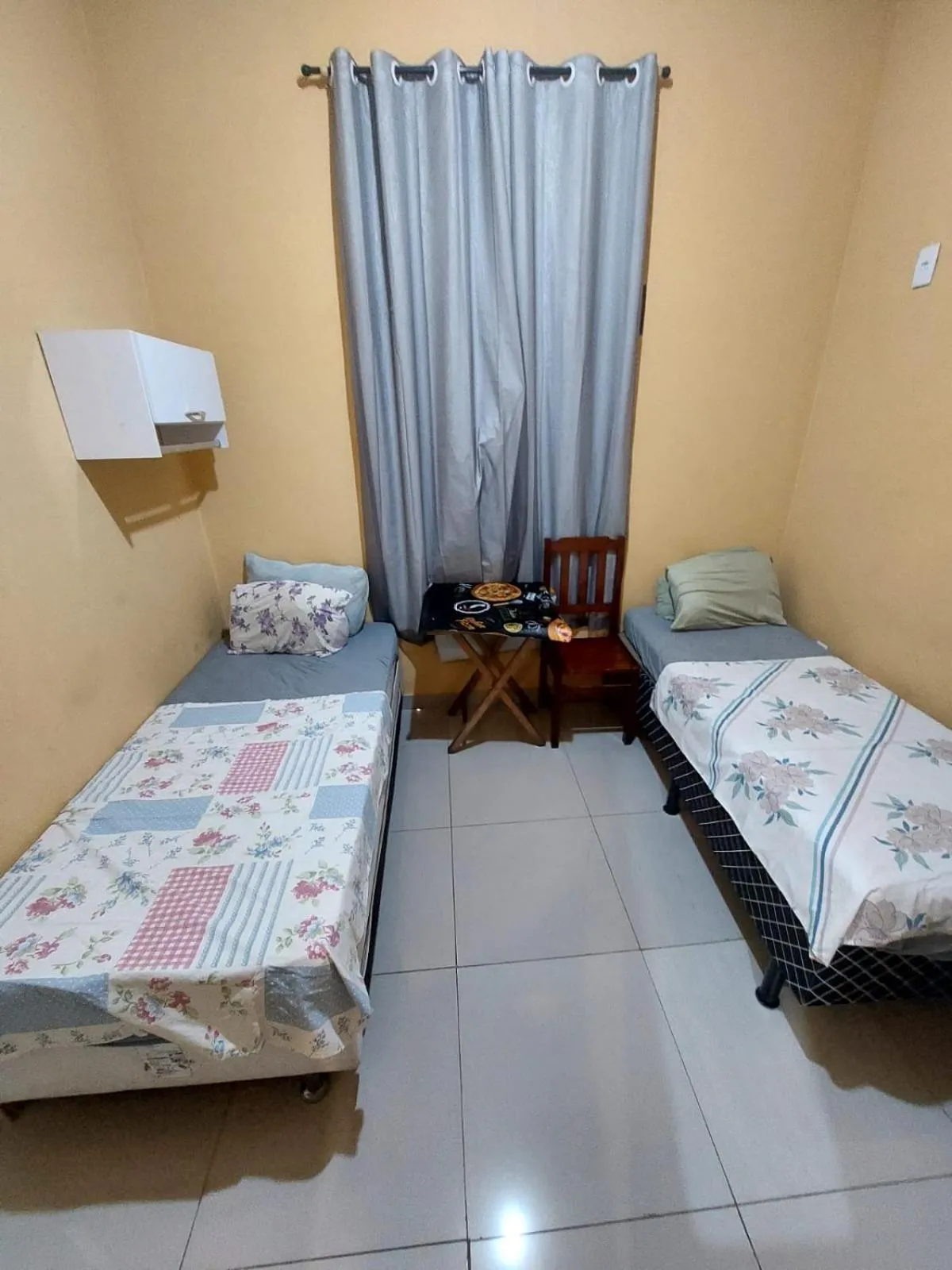 Bed in Pousada Cantinho da Família