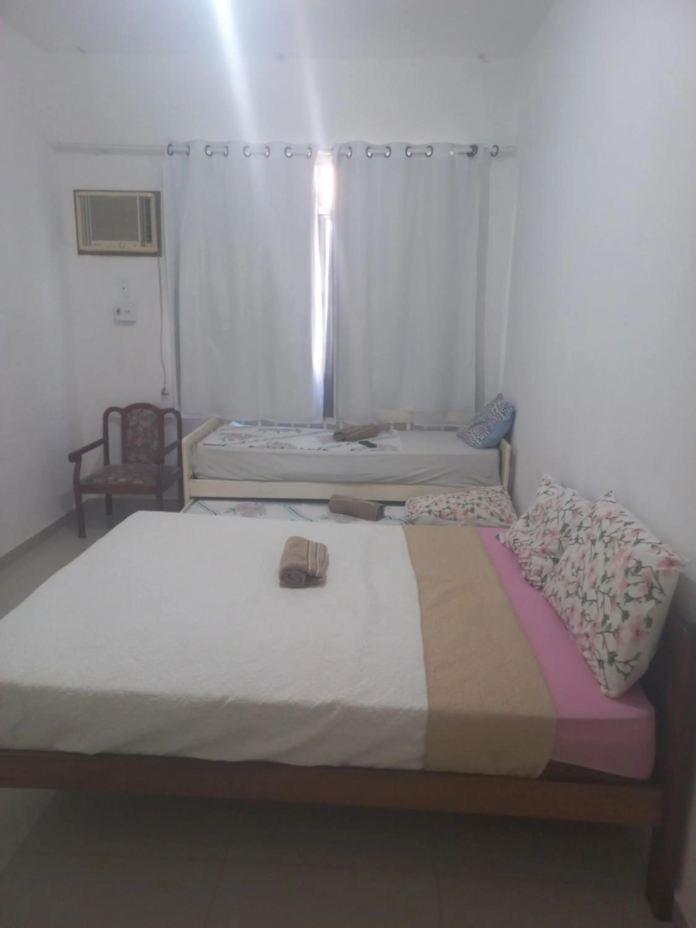 Bed in Pousada Cantinho da Família