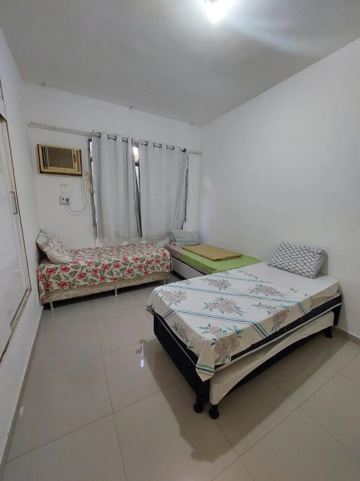 Bed in Pousada Cantinho da Família