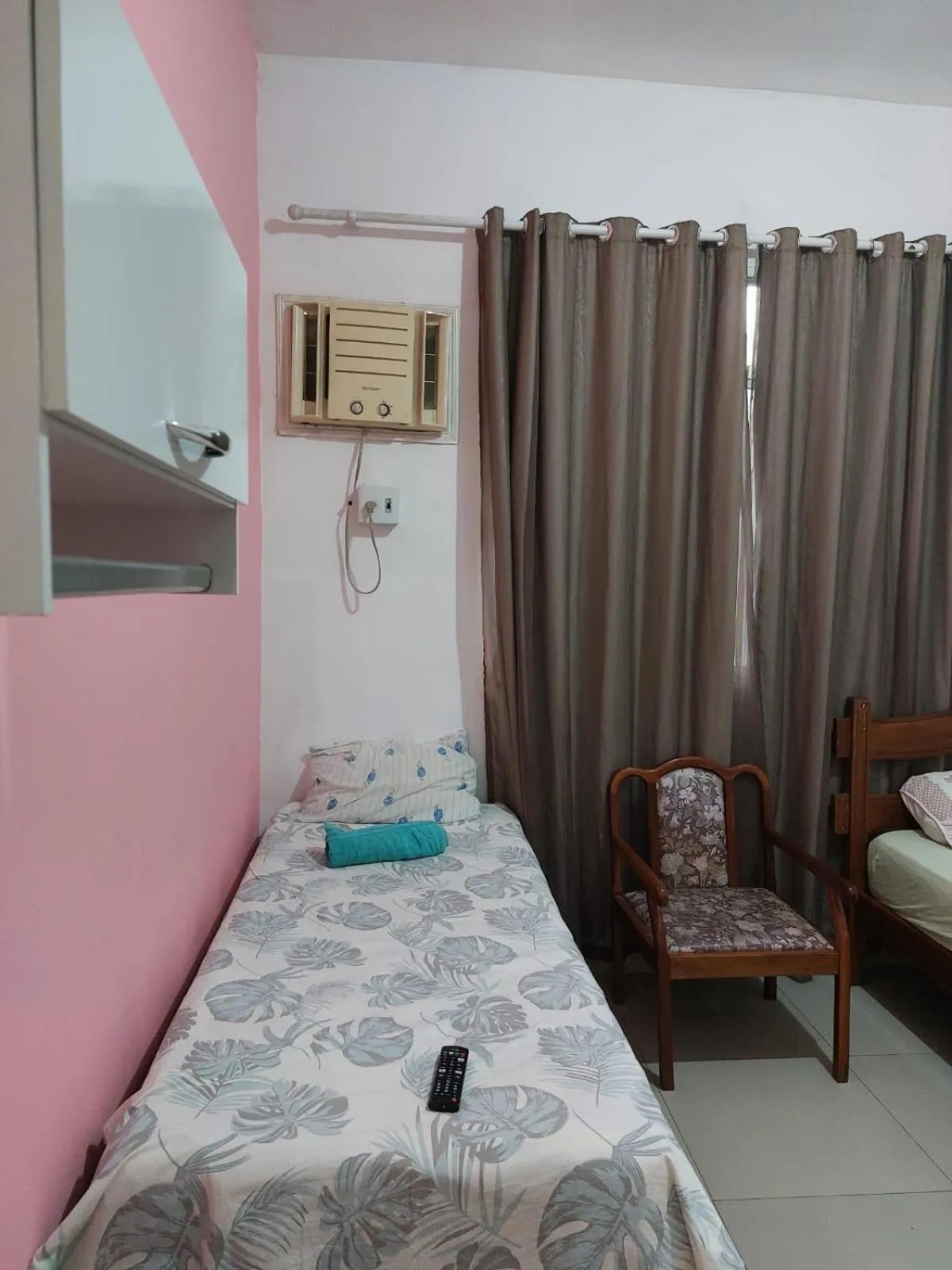 Bed in Pousada Cantinho da Família