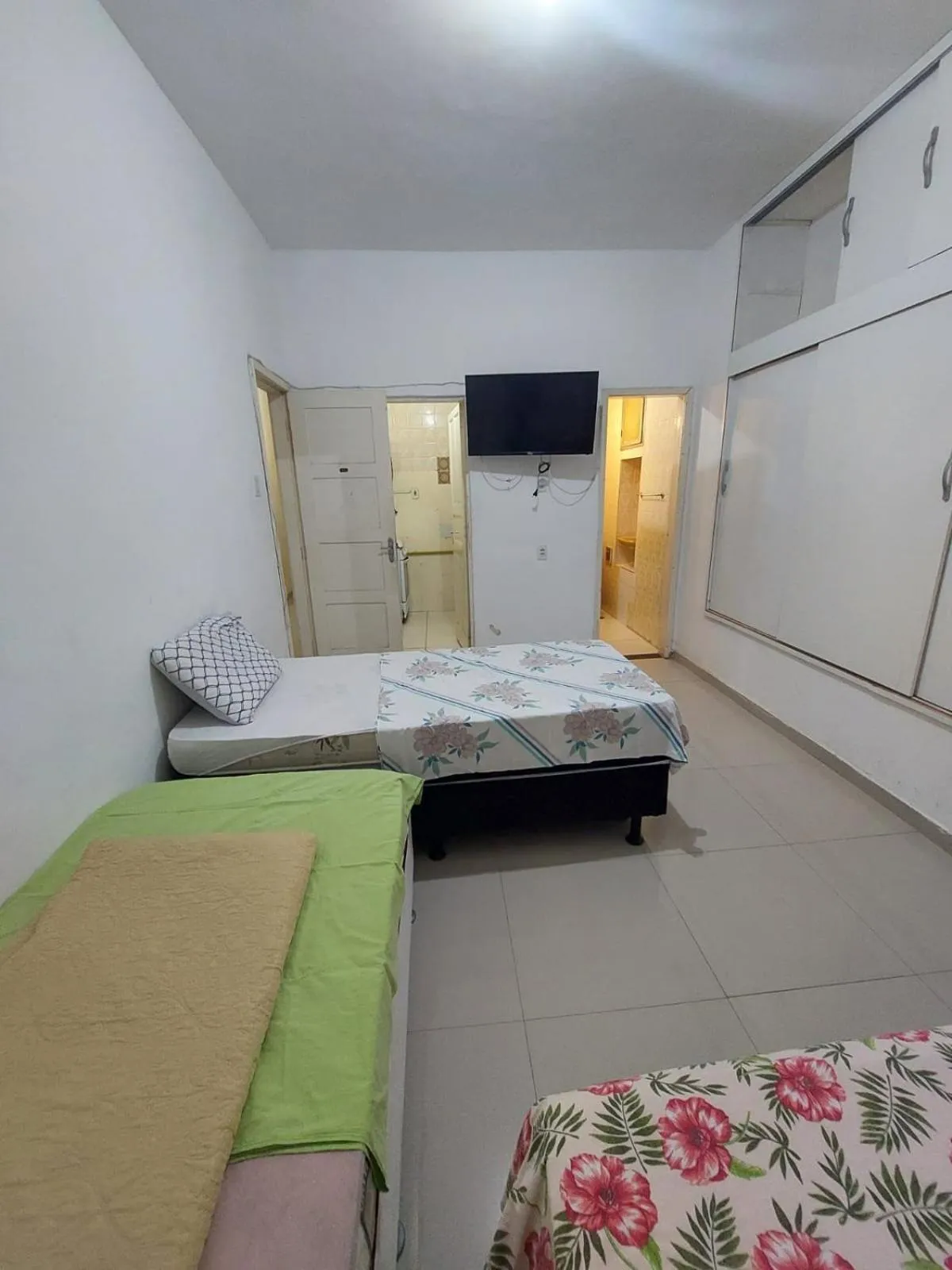 Bed in Pousada Cantinho da Família