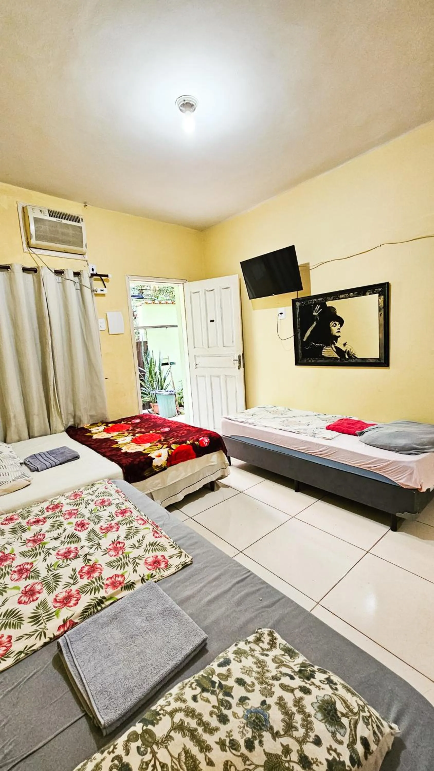 Bed in Pousada Cantinho da Família