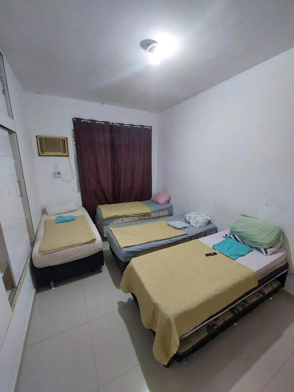 Bed in Pousada Cantinho da Família