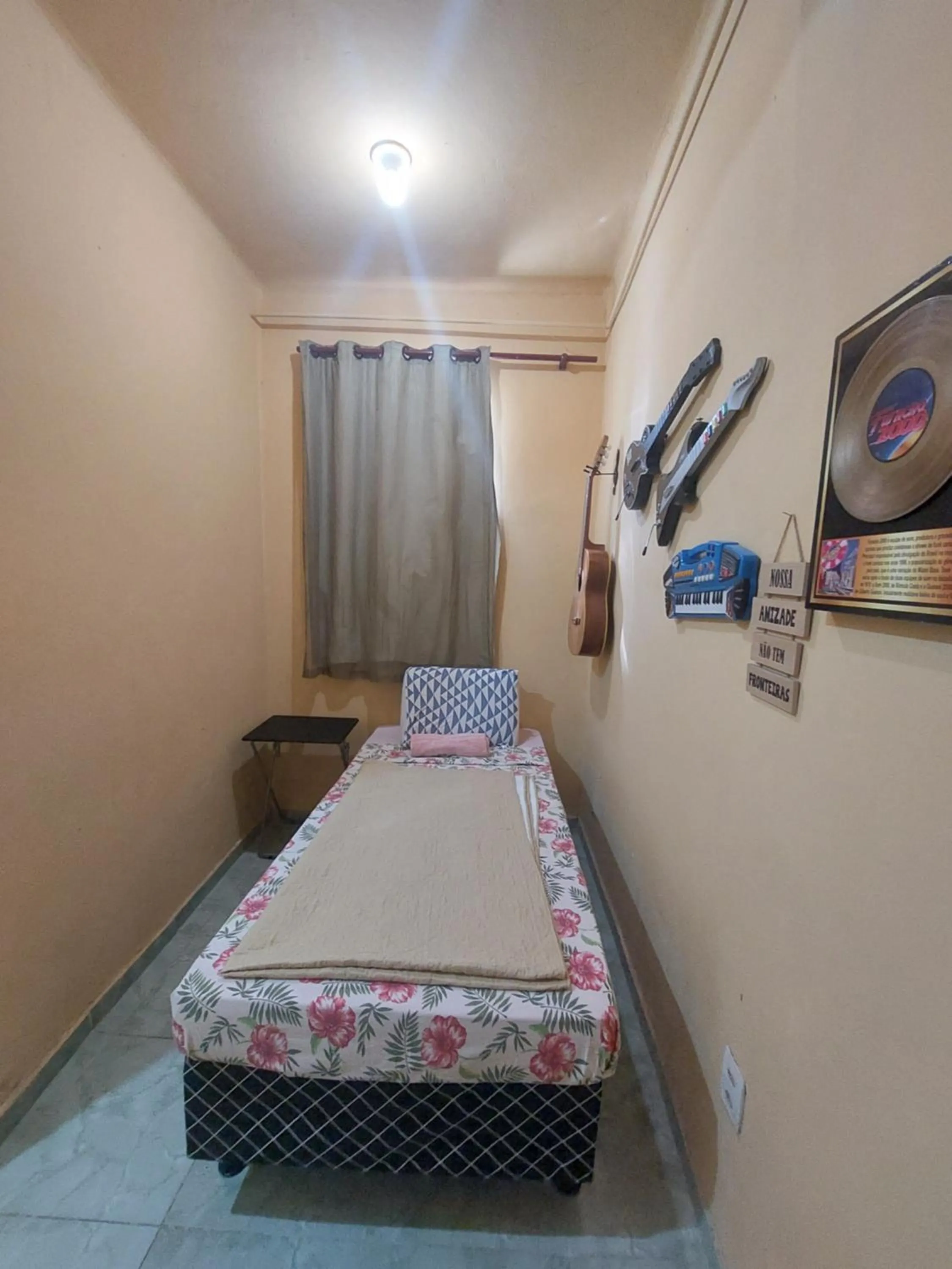 Bed in Pousada Cantinho da Família