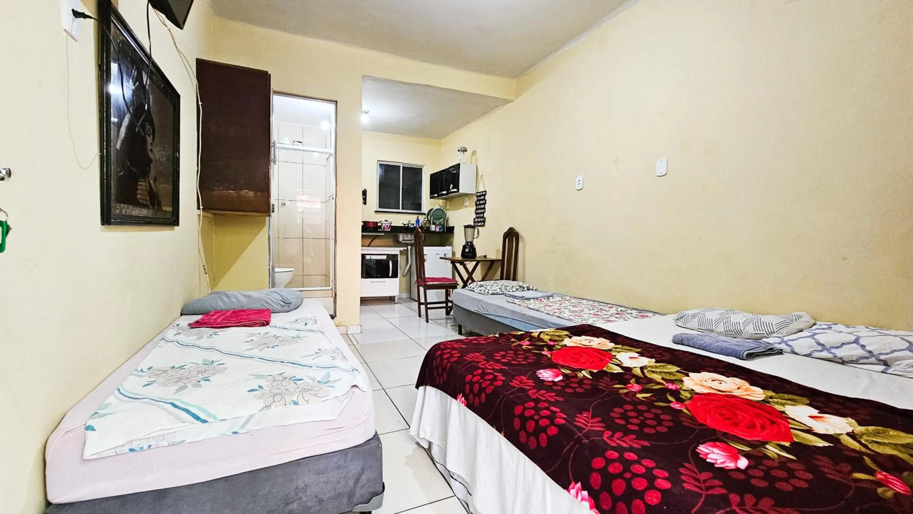 Bed in Pousada Cantinho da Família