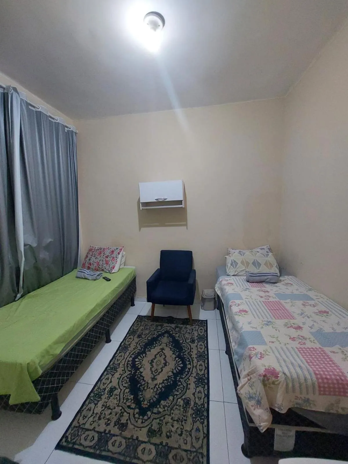 Bed in Pousada Cantinho da Família