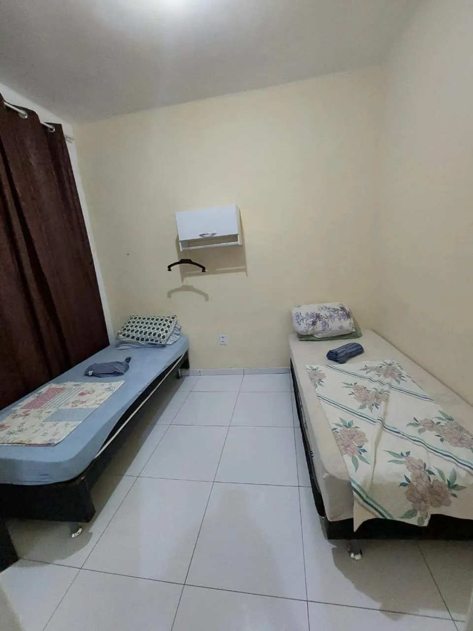 Bed in Pousada Cantinho da Família