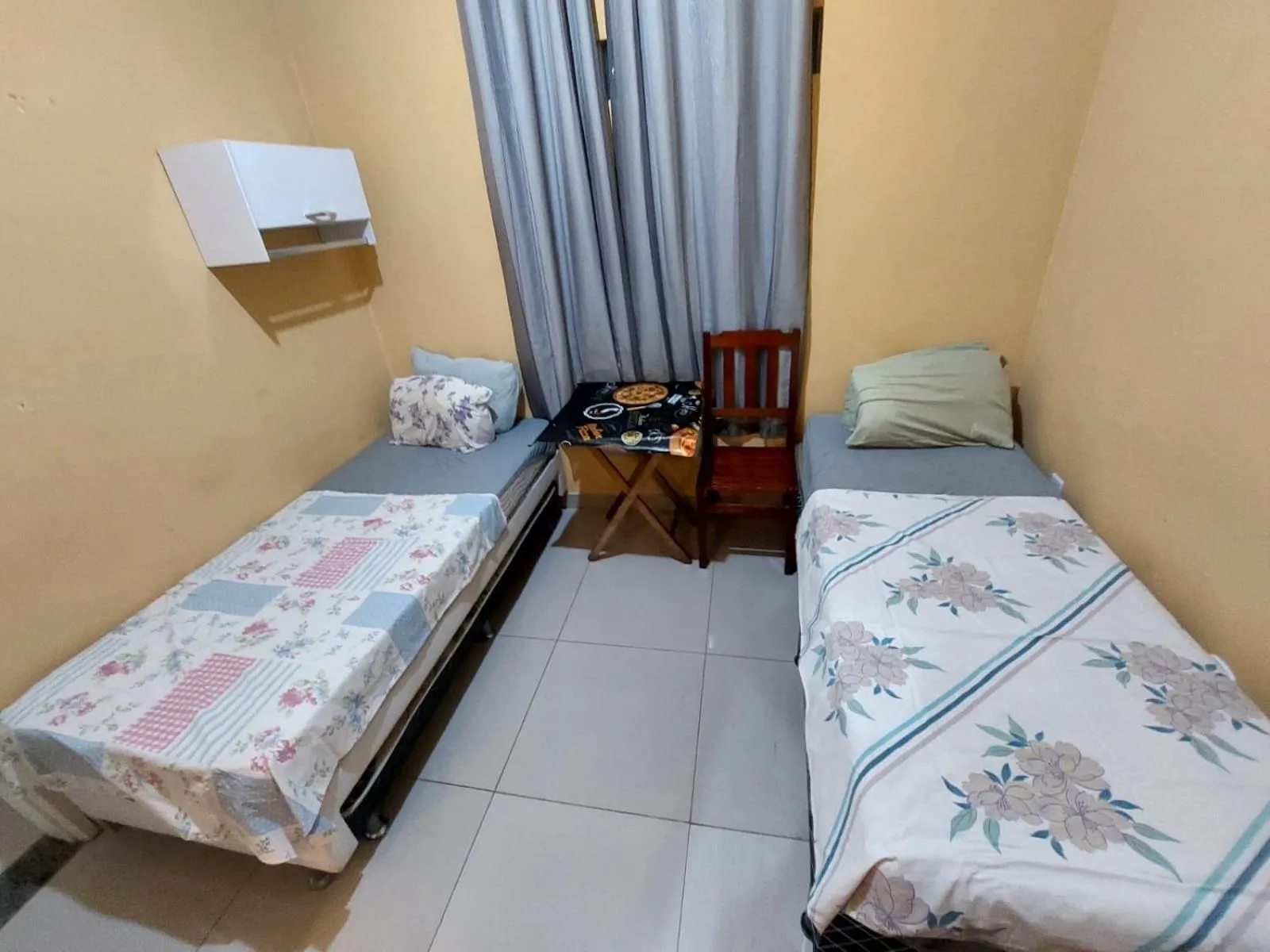 Bed in Pousada Cantinho da Família