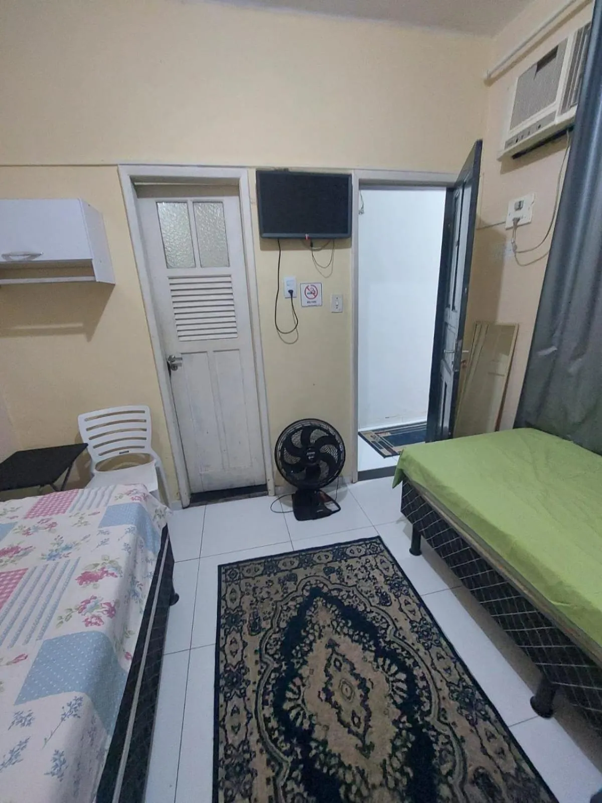 Bed in Pousada Cantinho da Família