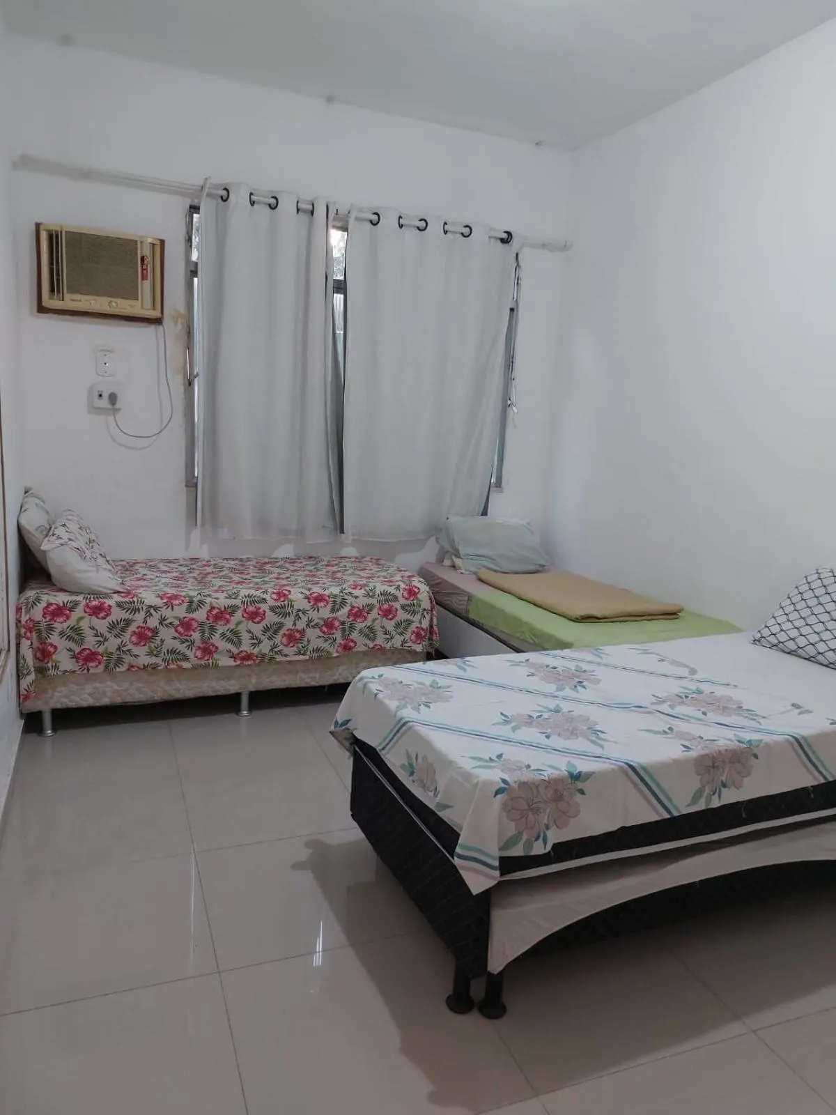 Bed in Pousada Cantinho da Família