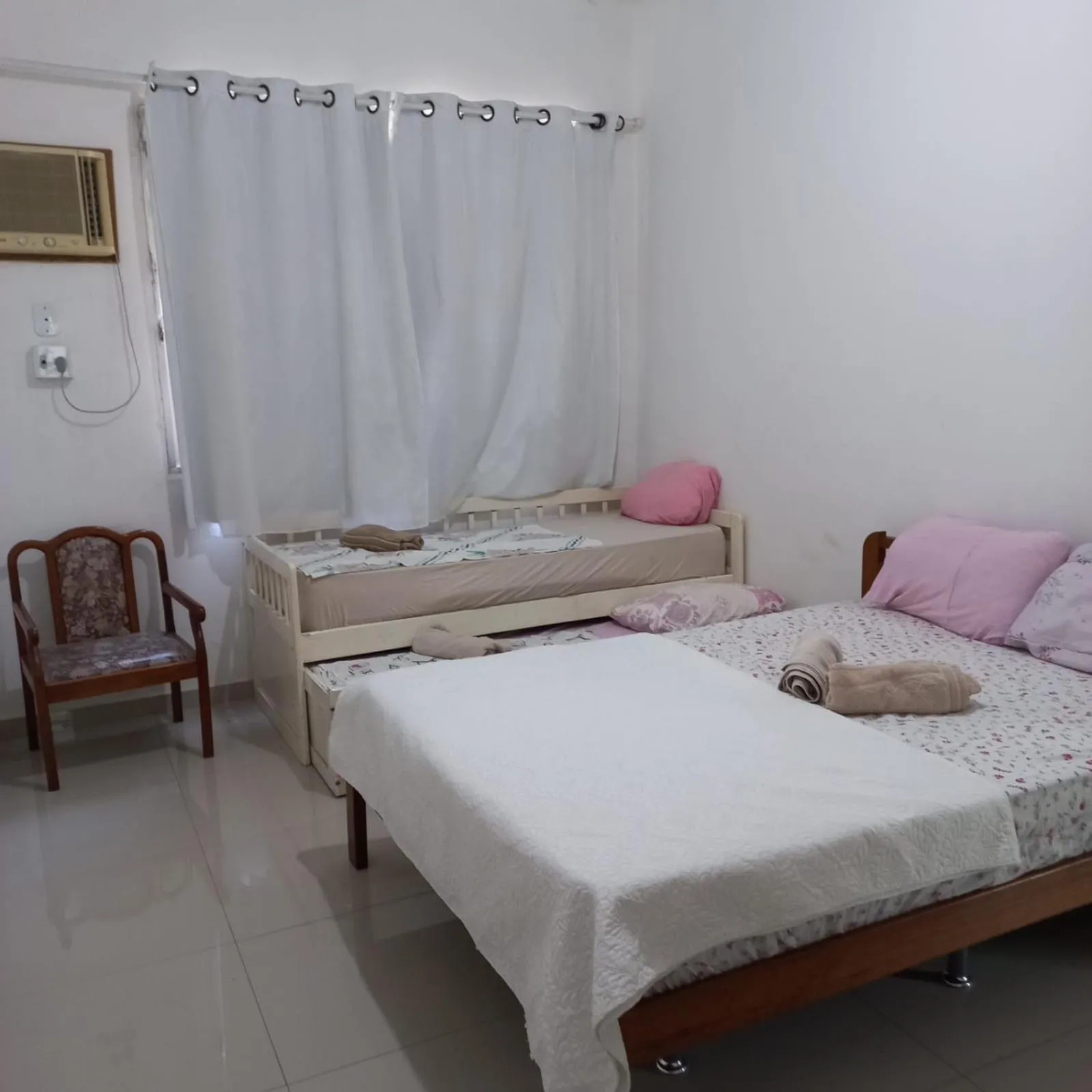 Bed in Pousada Cantinho da Família