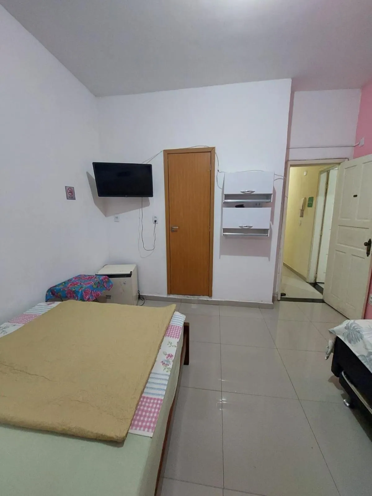 Bed in Pousada Cantinho da Família