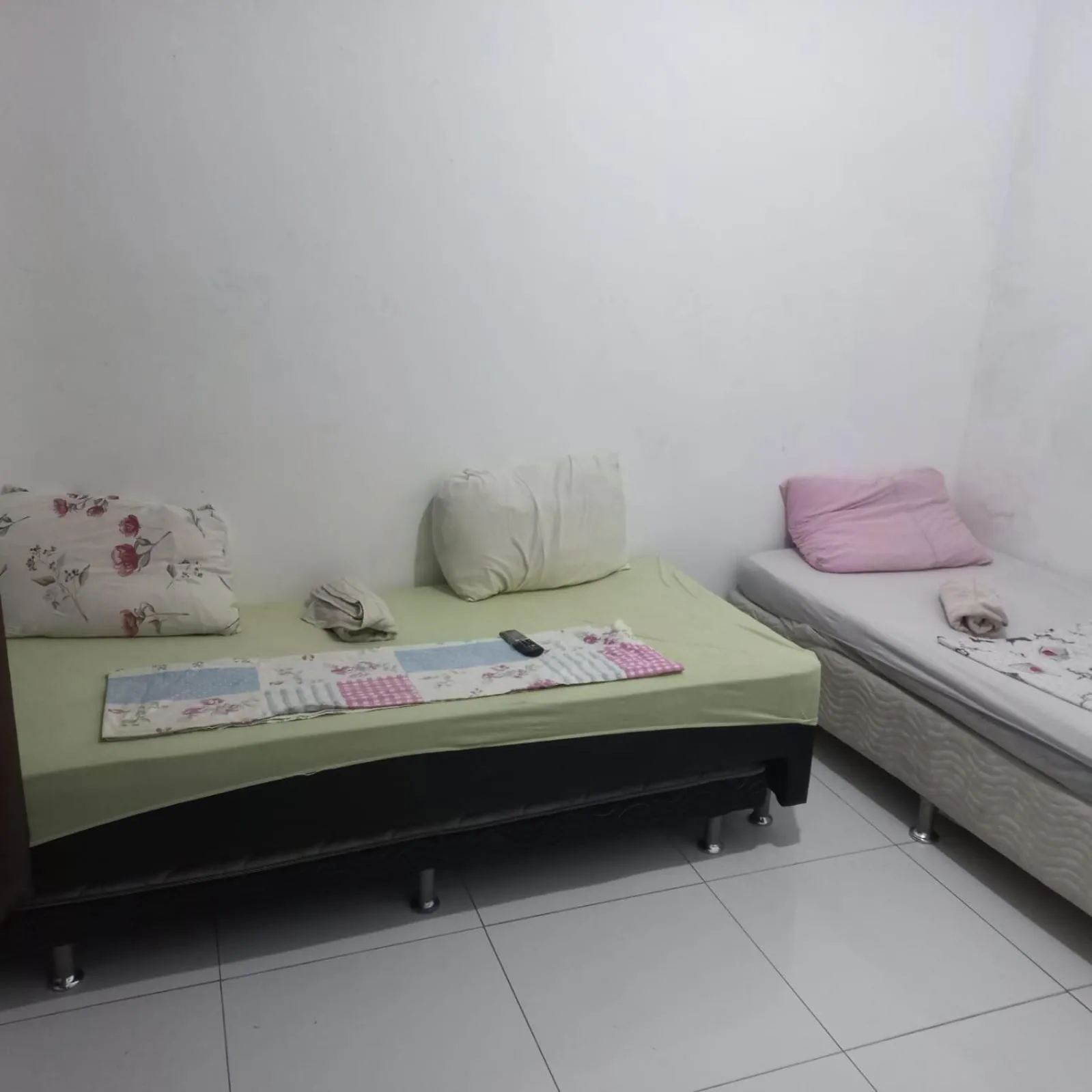 Bed in Pousada Cantinho da Família