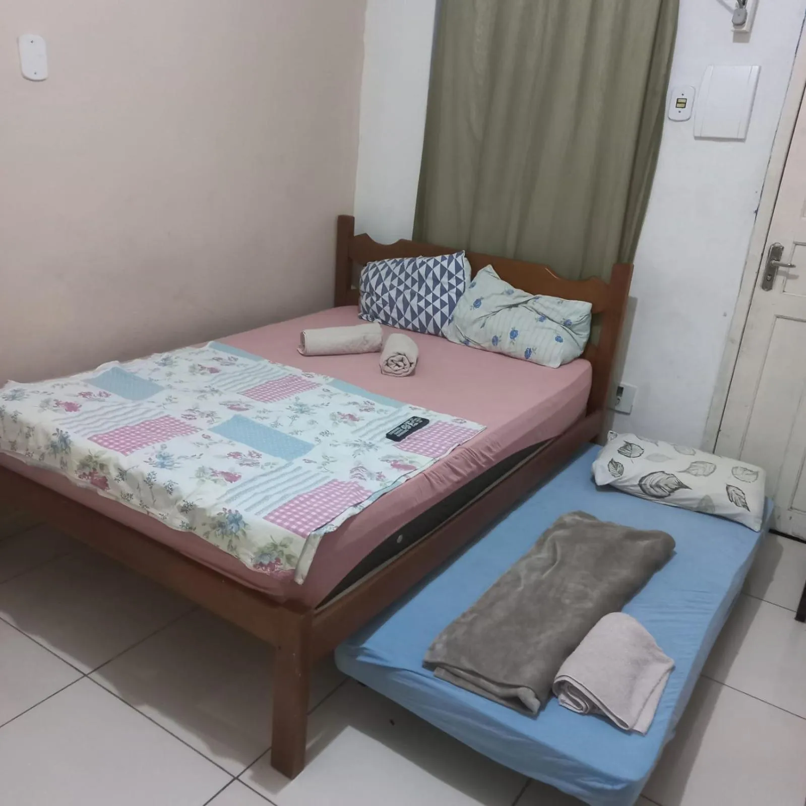 Bed in Pousada Cantinho da Família